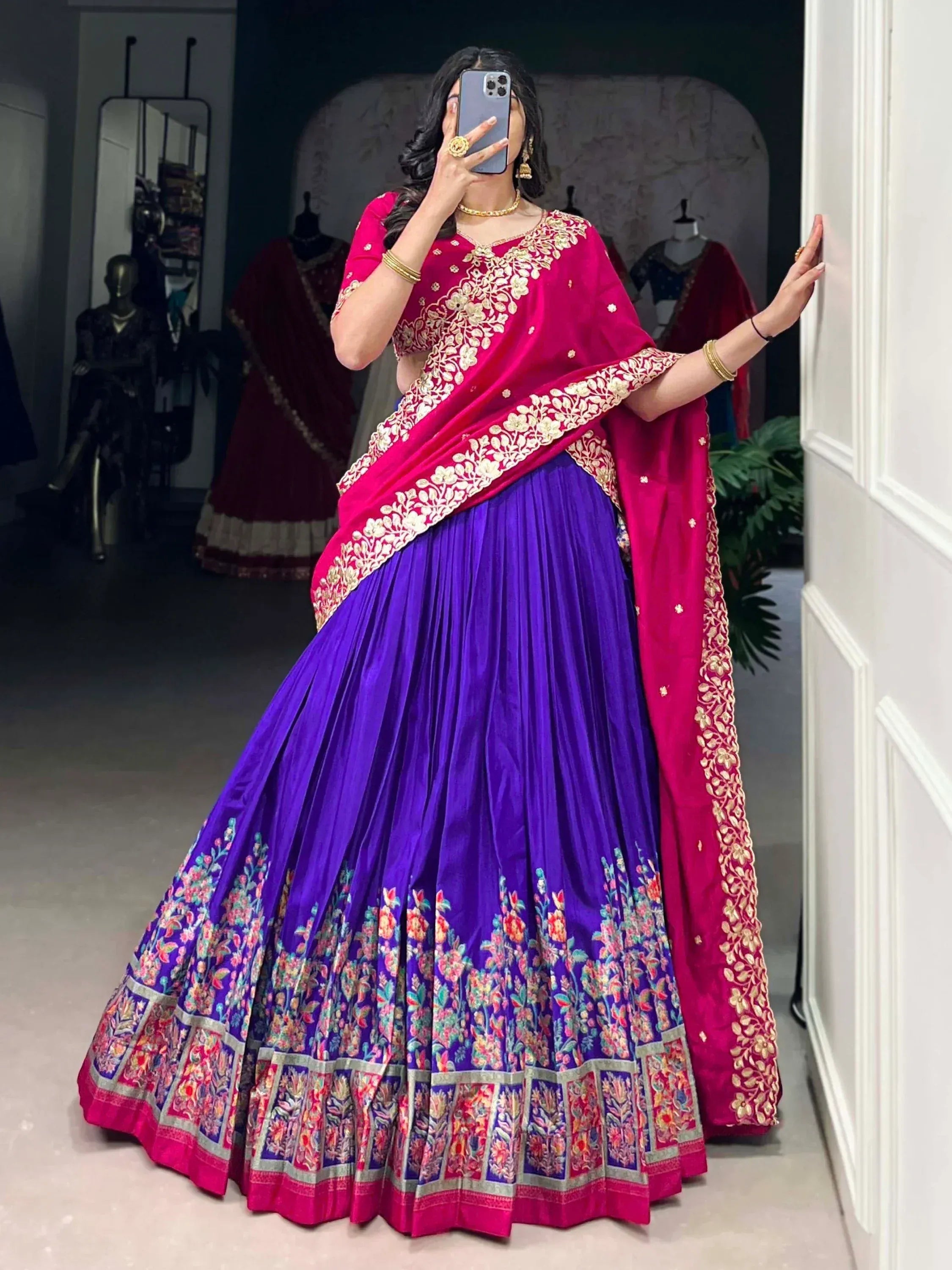 Purple and pink embroidered lehenga choli with floral border, perfect for Indian ethnic wear occasions