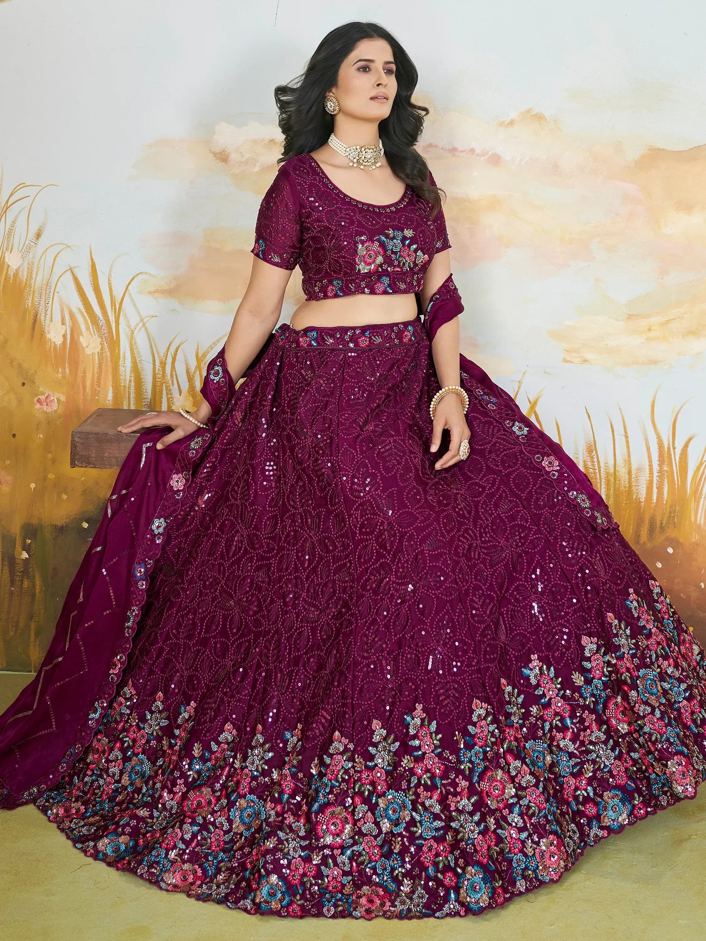 Elegant maroon lehenga choli with floral embroidery and sequins, perfect for Indian ethnic wear occasions