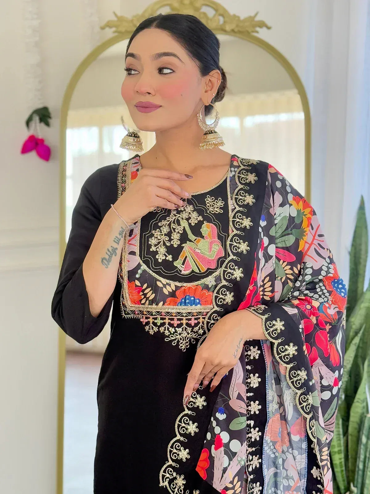 Black embroidered ethnic kurti with floral dupatta, perfect for Indian festive wear