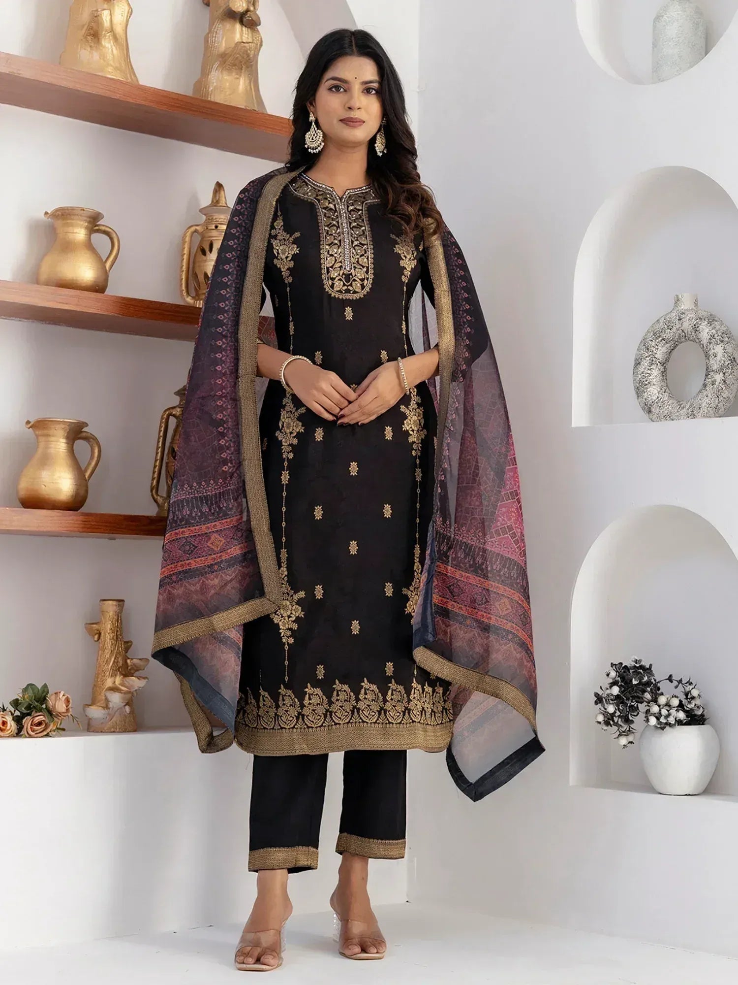 Black embroidered salwar kameez with gold detailing and printed dupatta, ethnic Indian wear