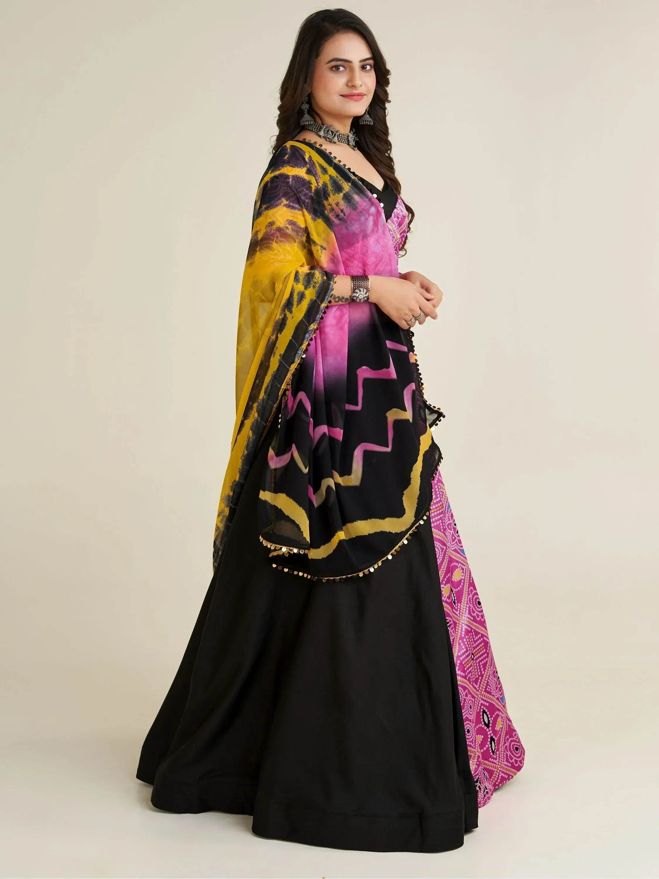 Black and pink printed lehenga choli with yellow dupatta, ethnic Indian wear for women
