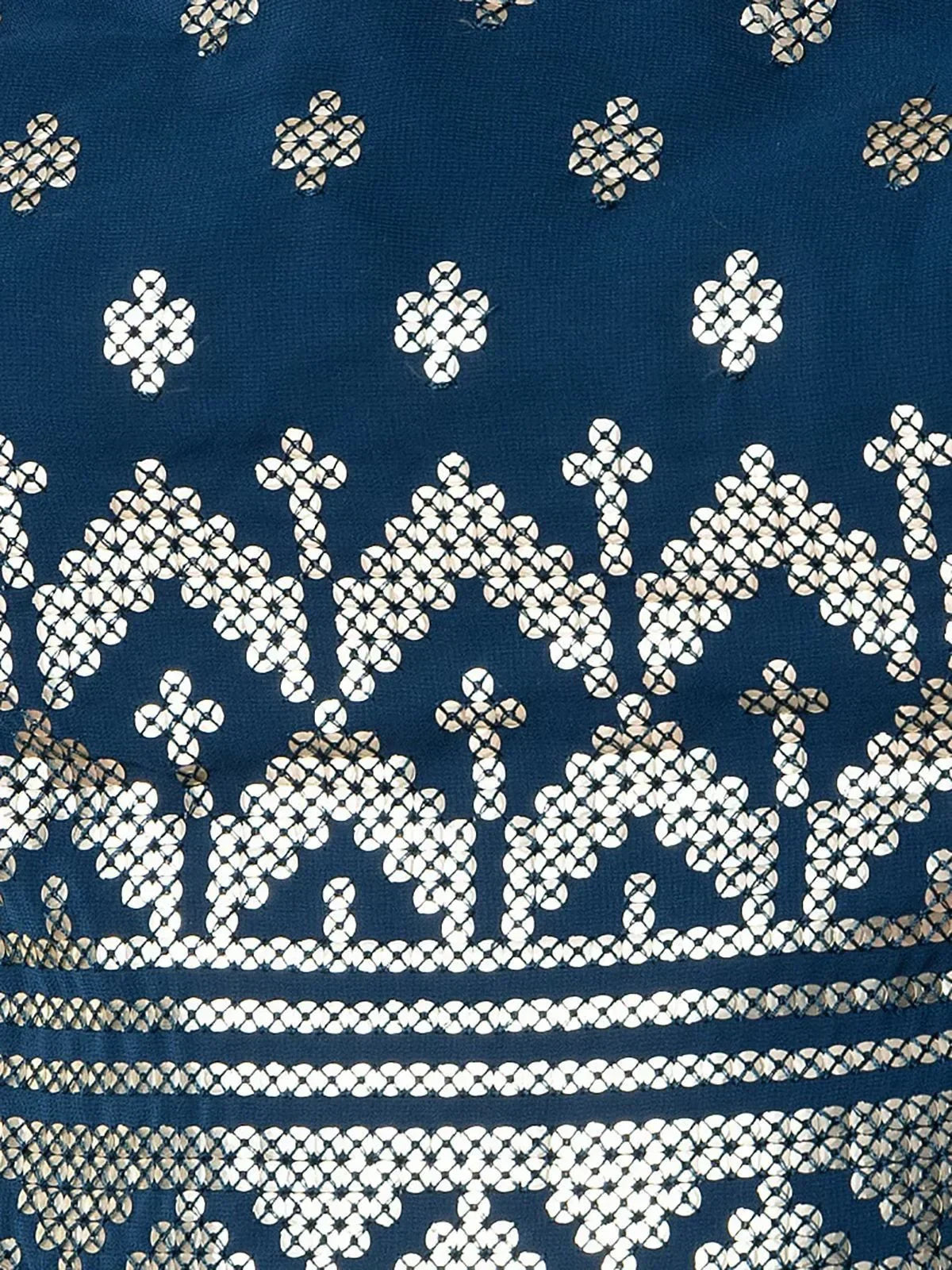 Blue ethnic wear with intricate white mirror work and floral patterns, perfect for Indian festive occasions.
