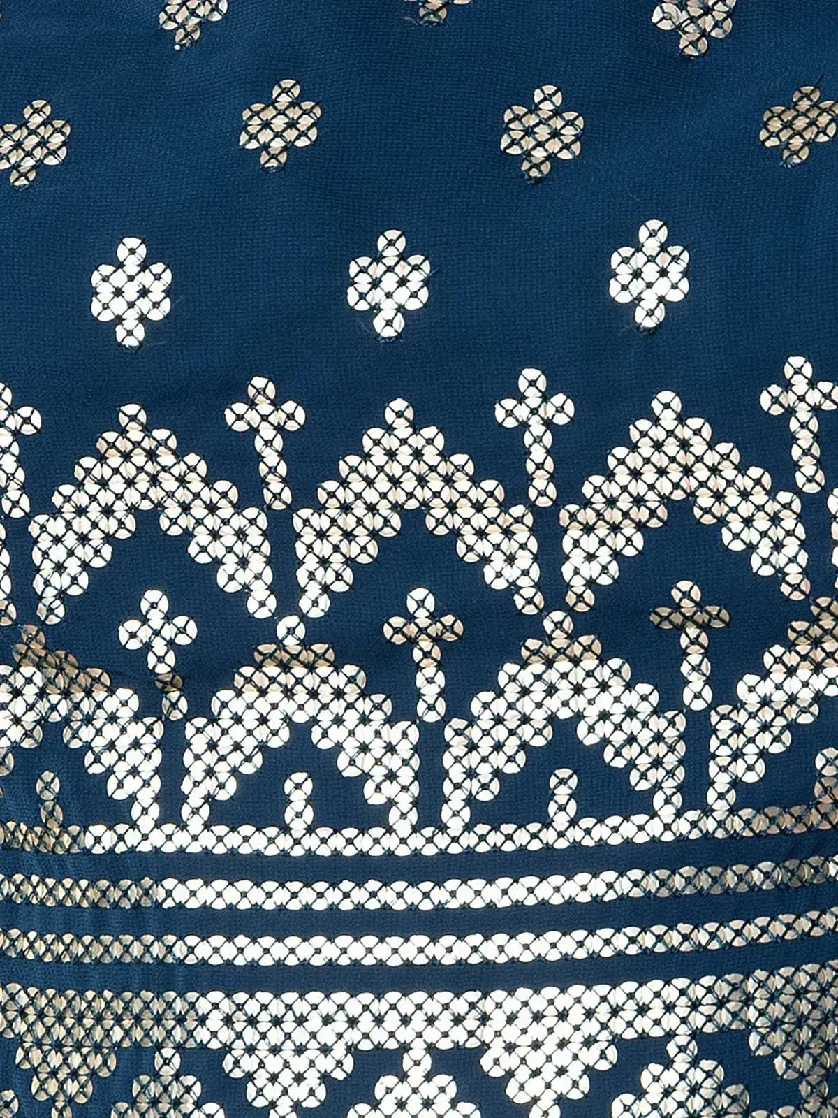 Blue ethnic wear with intricate white mirror work and floral patterns, perfect for Indian festive occasions.