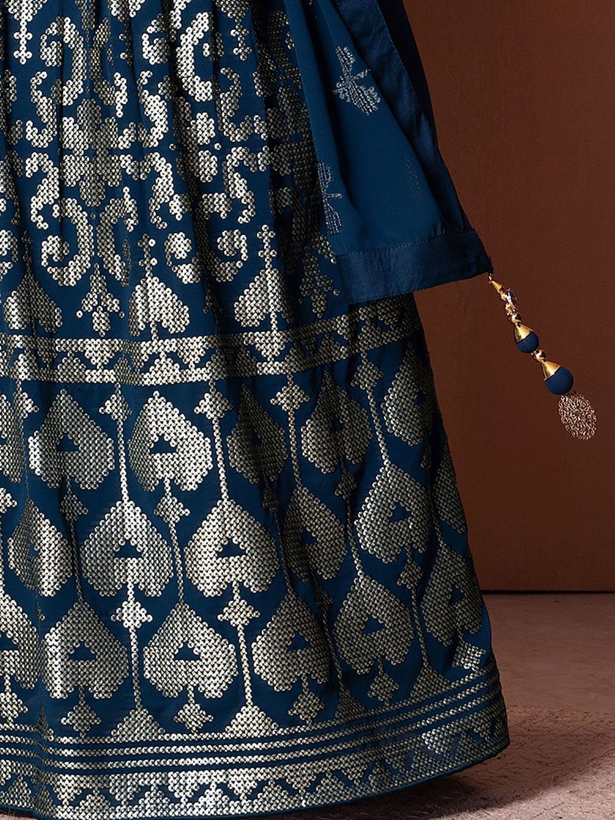 Navy blue ethnic lehenga with intricate silver embroidery and tassel detail