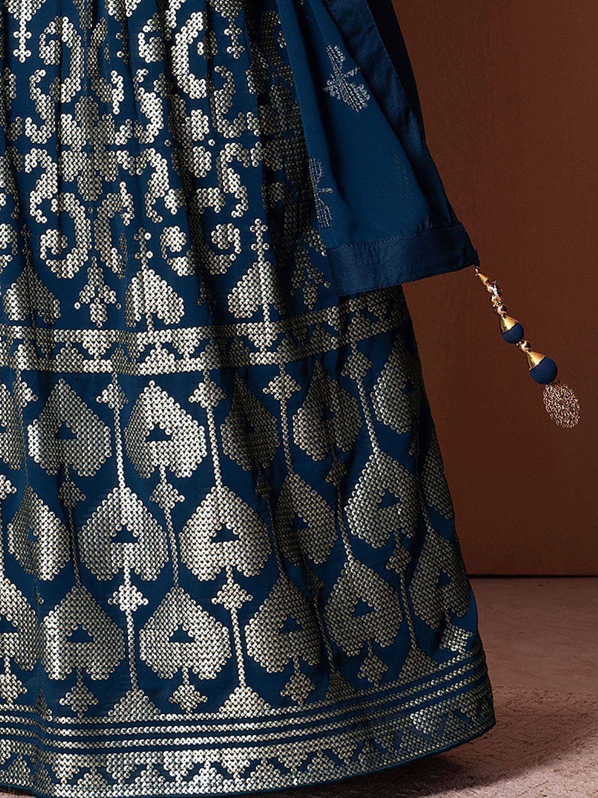 Navy blue ethnic lehenga with intricate silver embroidery and tassel detail
