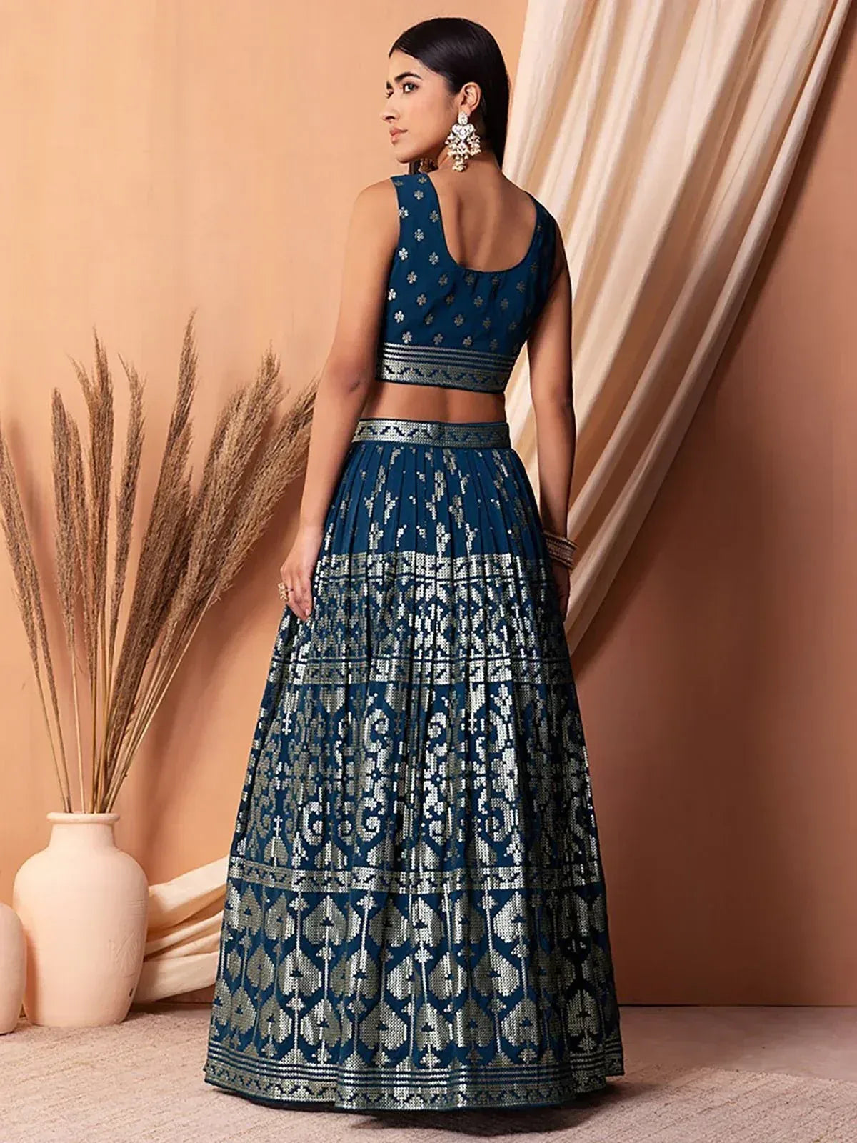 Purple designer lehenga choli with gold embroidery and sheer dupatta for Indian weddings