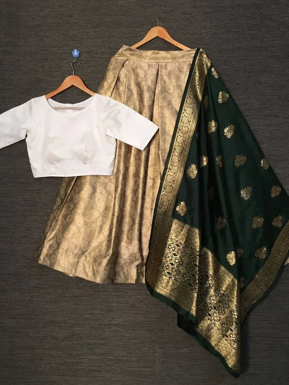 White crop top with gold pleated skirt and green gold embroidered dupatta, Indian ethnic wear set