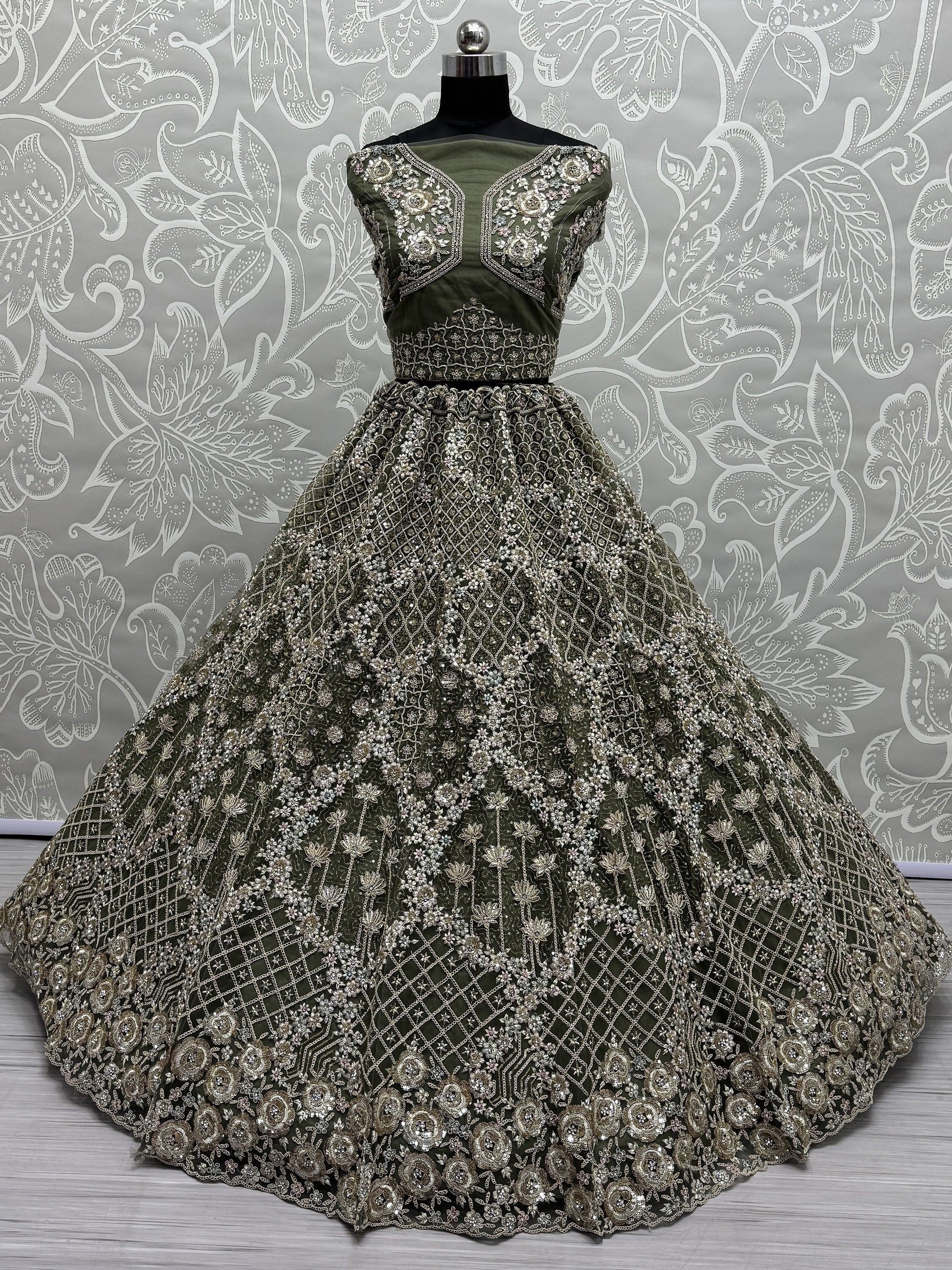 Olive green designer lehenga choli with heavy silver embroidery and floral motifs, perfect for weddings