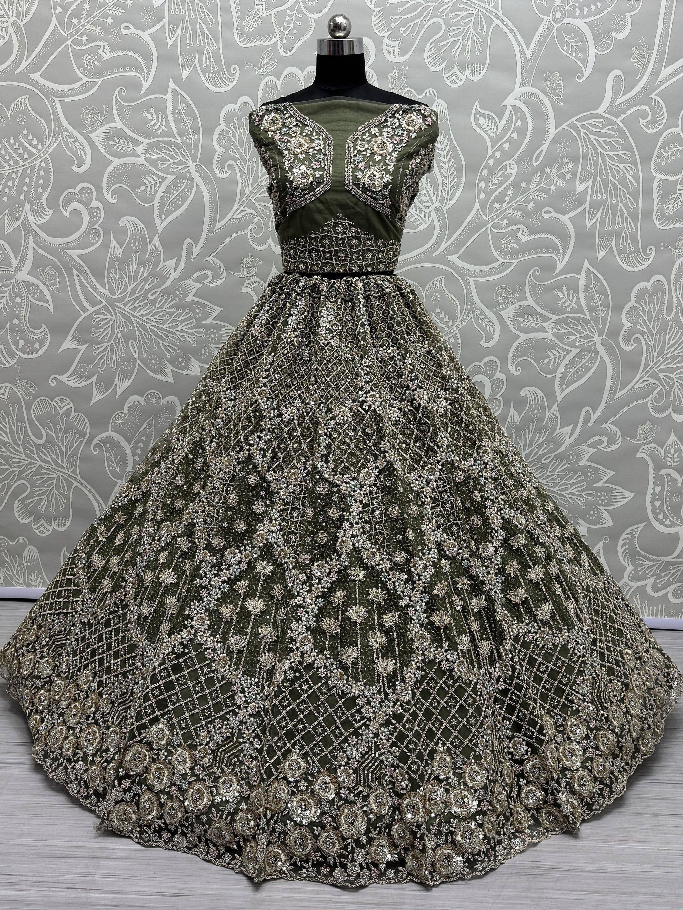 Olive green designer lehenga choli with heavy silver embroidery and floral motifs, perfect for weddings
