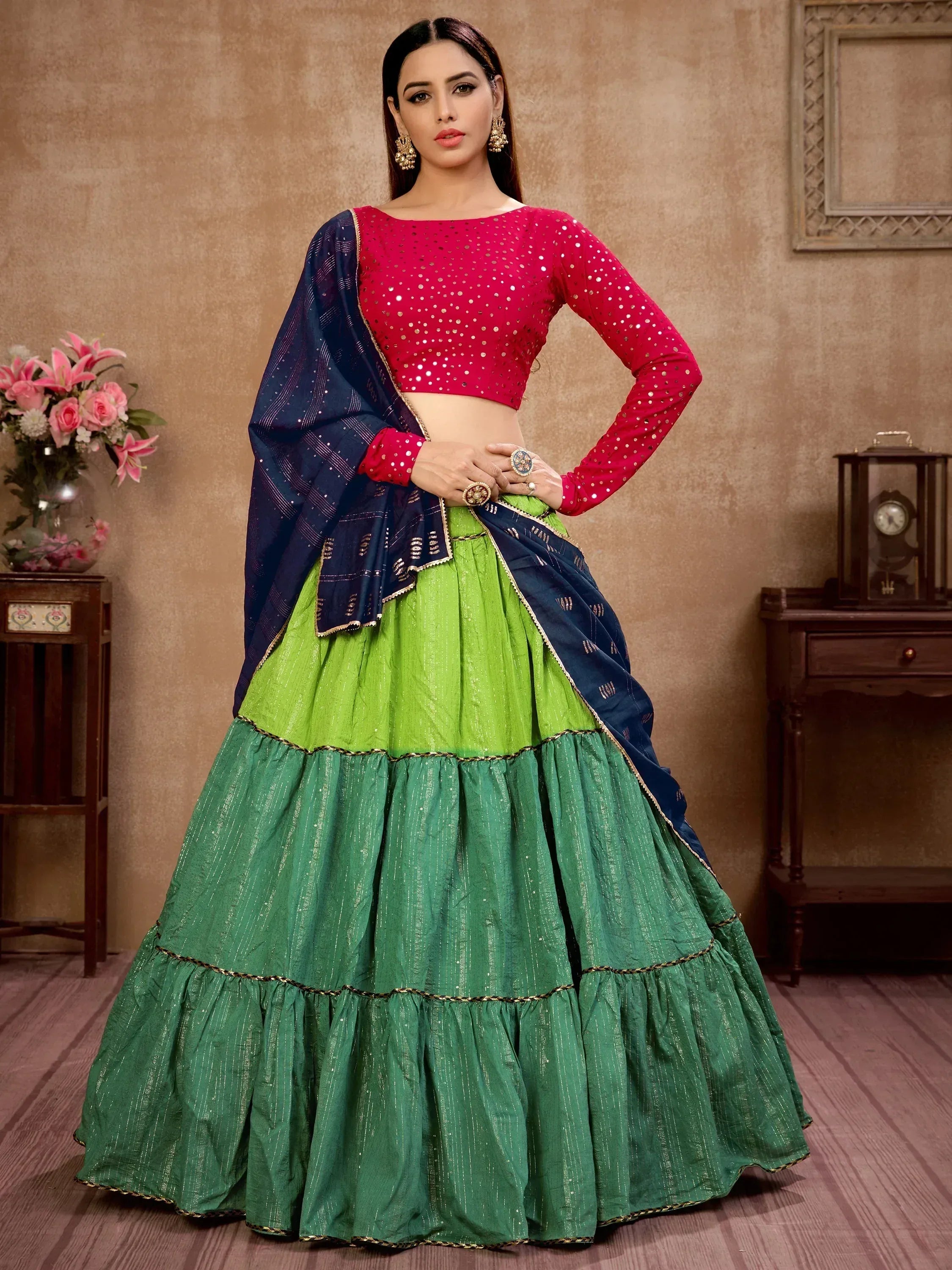 Vibrant green tiered lehenga with pink sequin blouse and navy dupatta, Indian ethnic wear