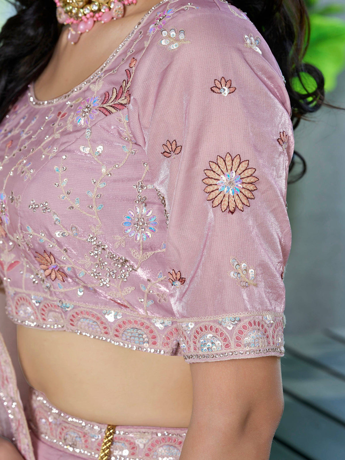 Pink embroidered lehenga choli with floral sequin detailing and embellished neckline