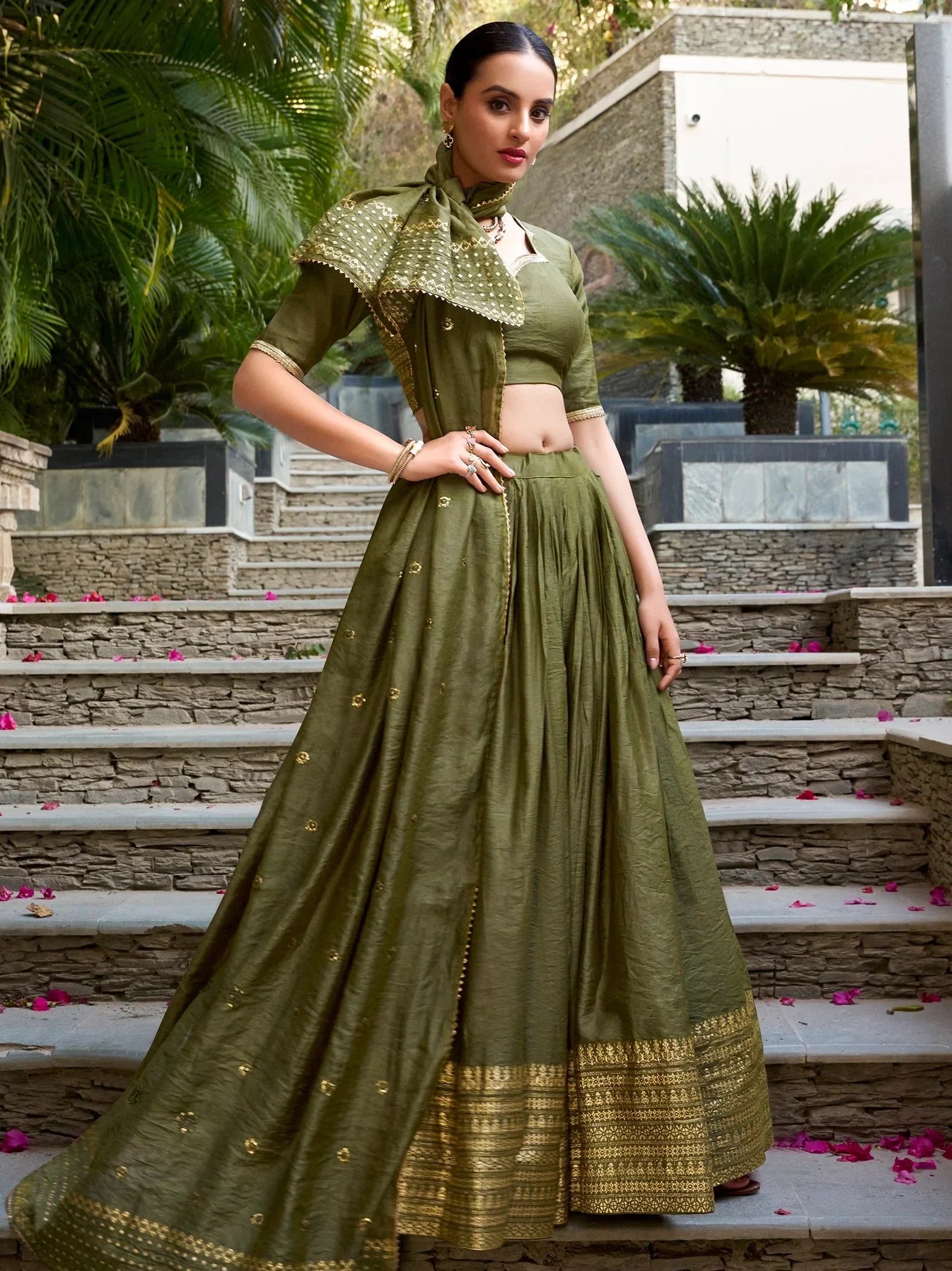 Olive green designer lehenga choli with gold embroidery, perfect for Indian ethnic wear occasions