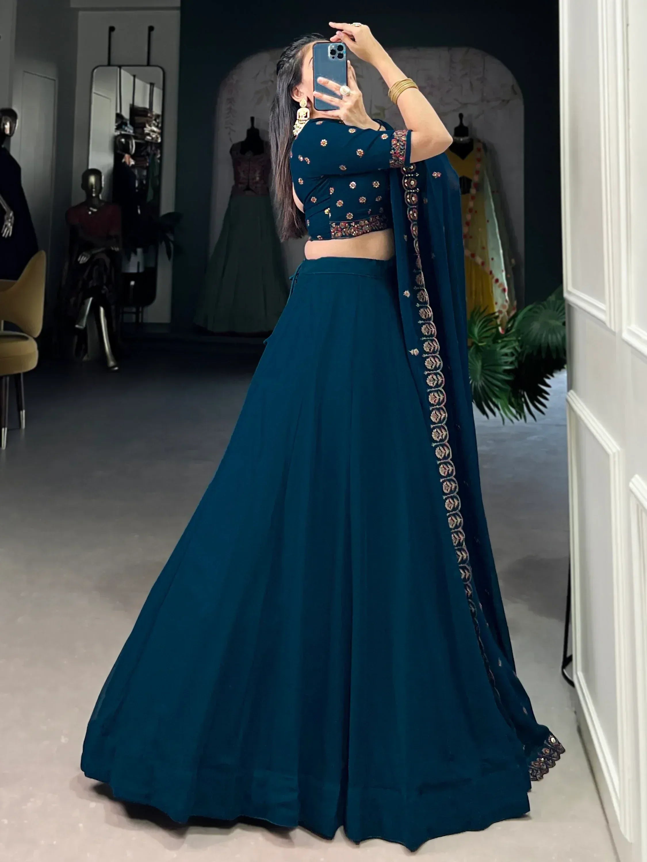 Teal designer lehenga choli with floral embroidery, perfect for Indian ethnic wear occasions