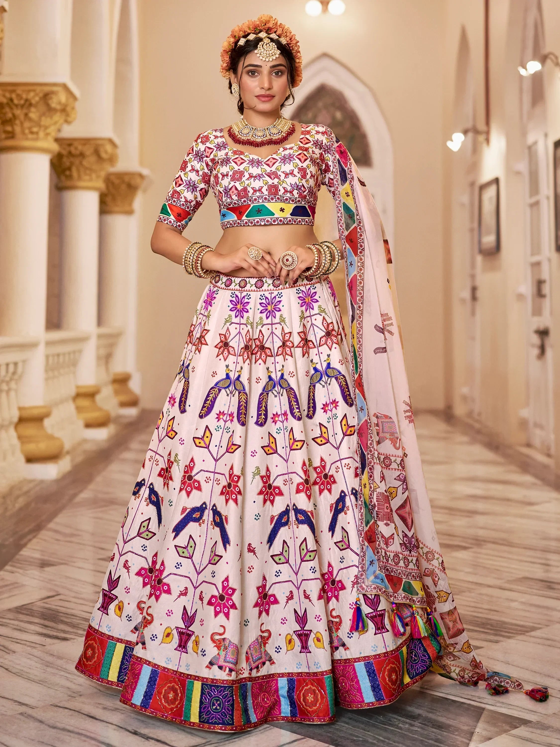 Colorful Indian lehenga choli with floral and peacock print, perfect for weddings and festivals