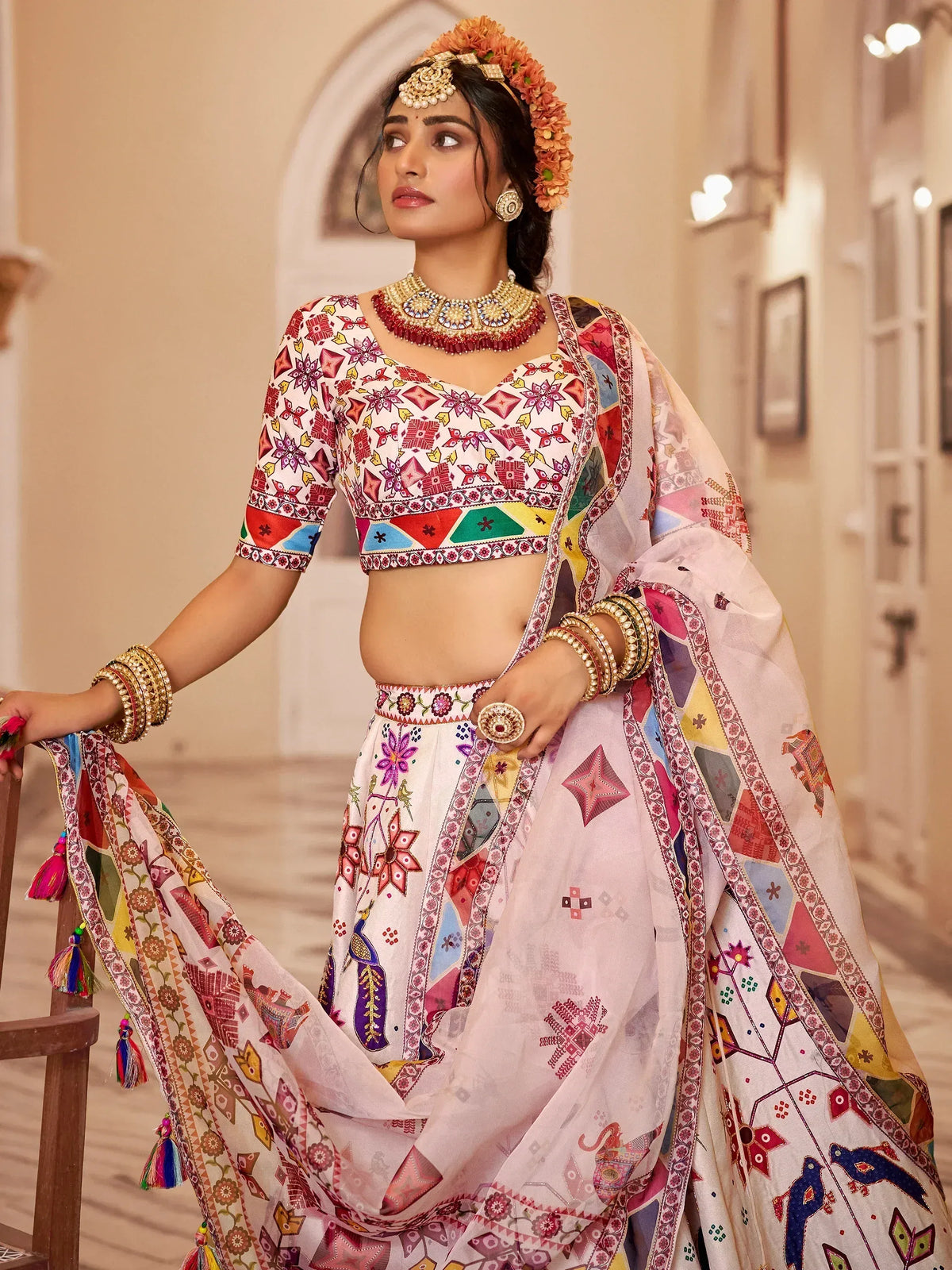 Colorful printed lehenga choli with floral dupatta, traditional Indian ethnic wear for women