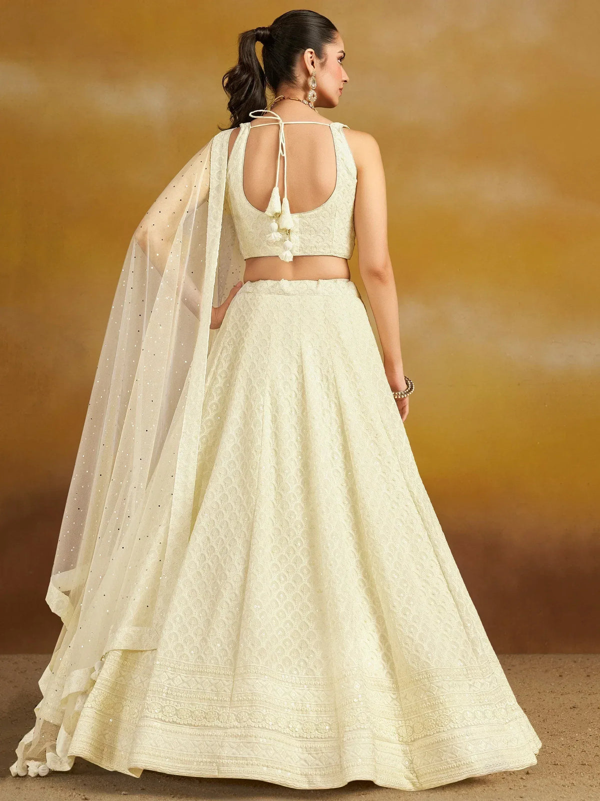 Cream embroidered lehenga choli with open back blouse and sequin dupatta, Indian ethnic wear