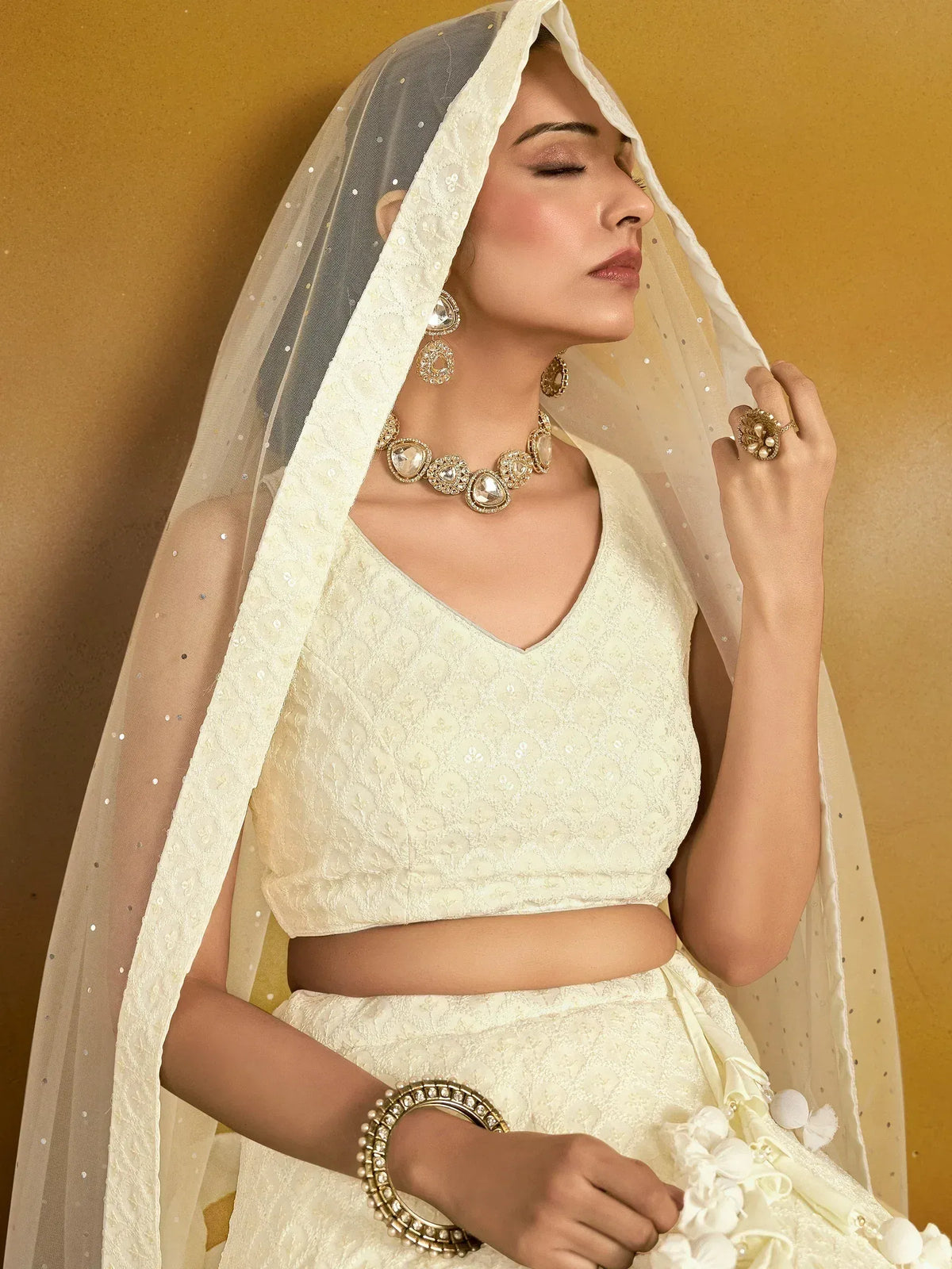 Cream embroidered lehenga choli with dupatta, traditional Indian bridal wear, designer ethnic outfit