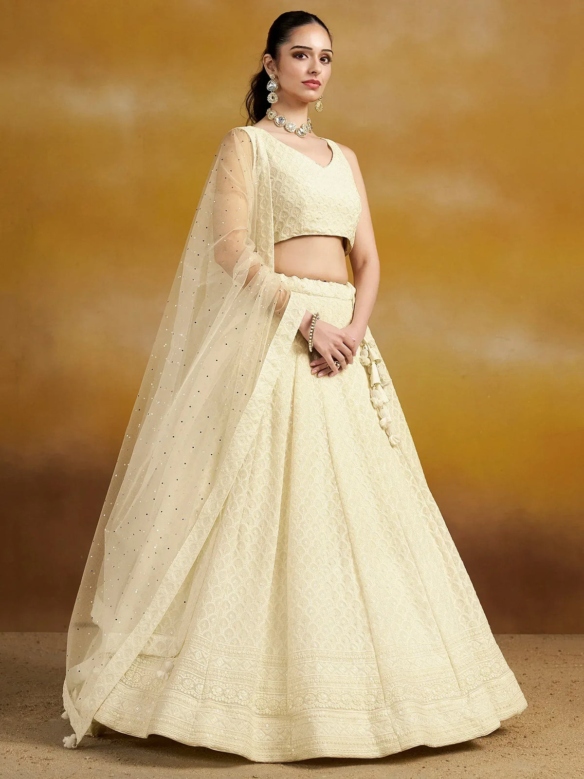 Cream embroidered lehenga choli with sheer dupatta, Indian ethnic wear for weddings and parties