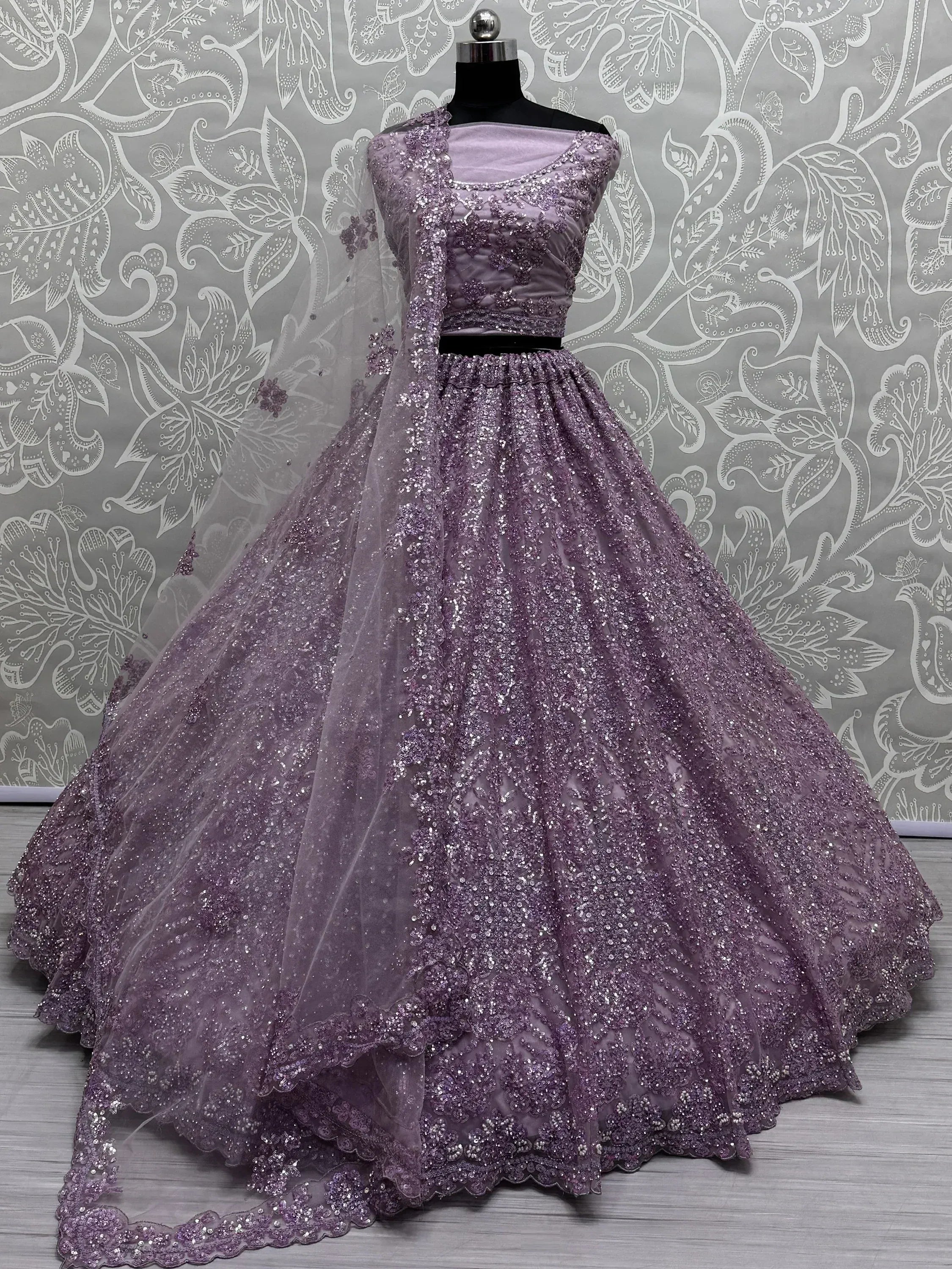 Lavender sequin lehenga choli with floral embroidery, perfect for Indian weddings and festive occasions.
