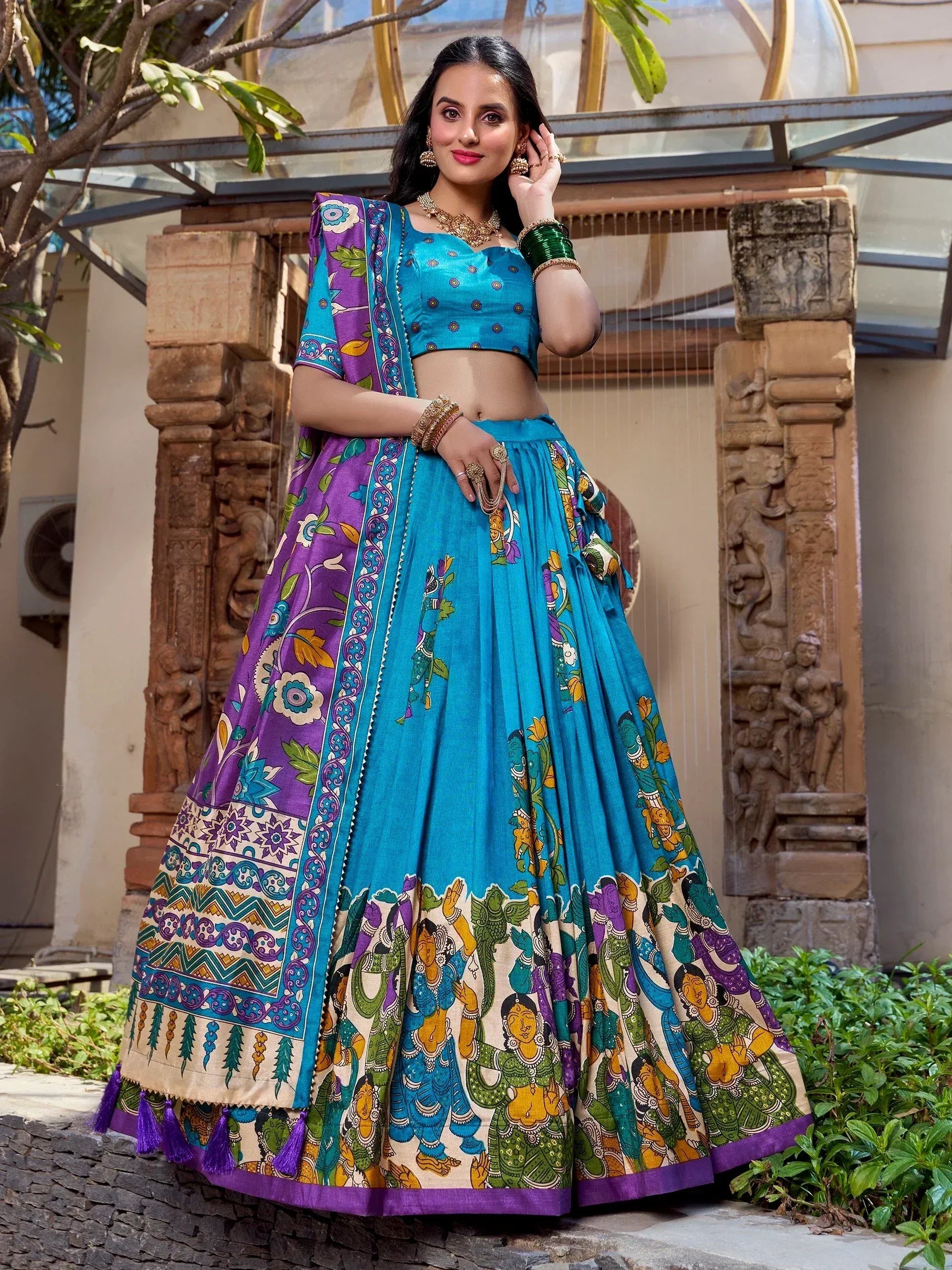 Blue and purple printed lehenga choli with ethnic motifs, perfect for Indian festive occasions