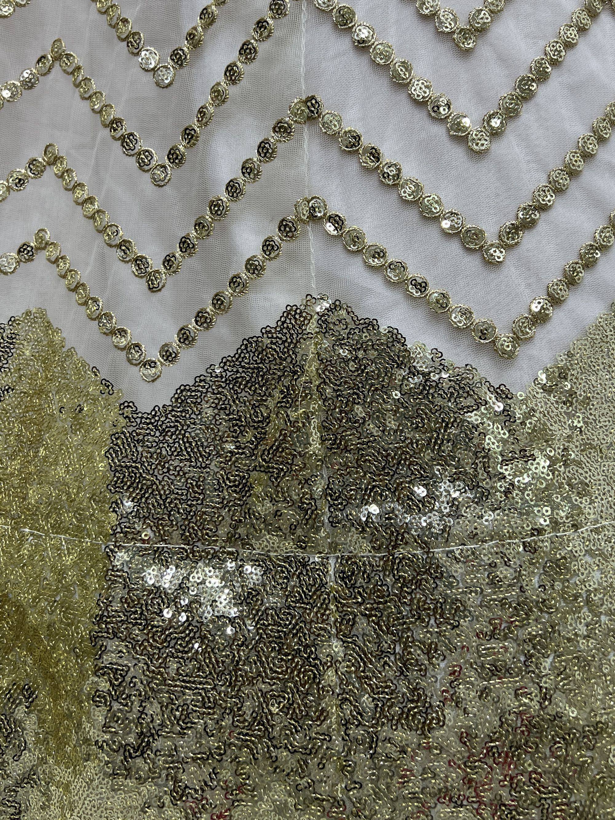 Gold sequin and thread embroidery on sheer fabric for ethnic wear