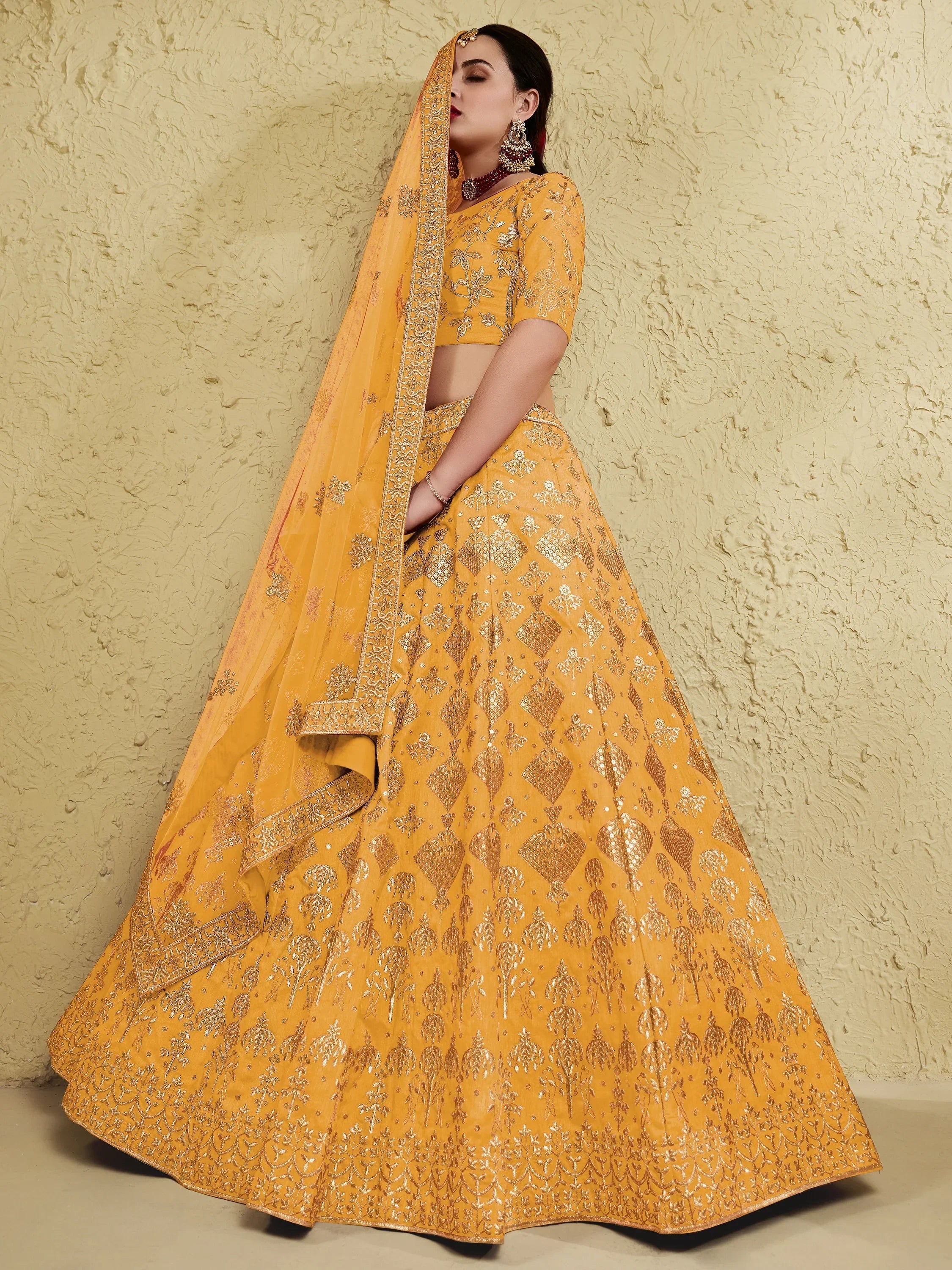 Yellow embroidered lehenga choli with dupatta, Indian ethnic wear for weddings and festivals