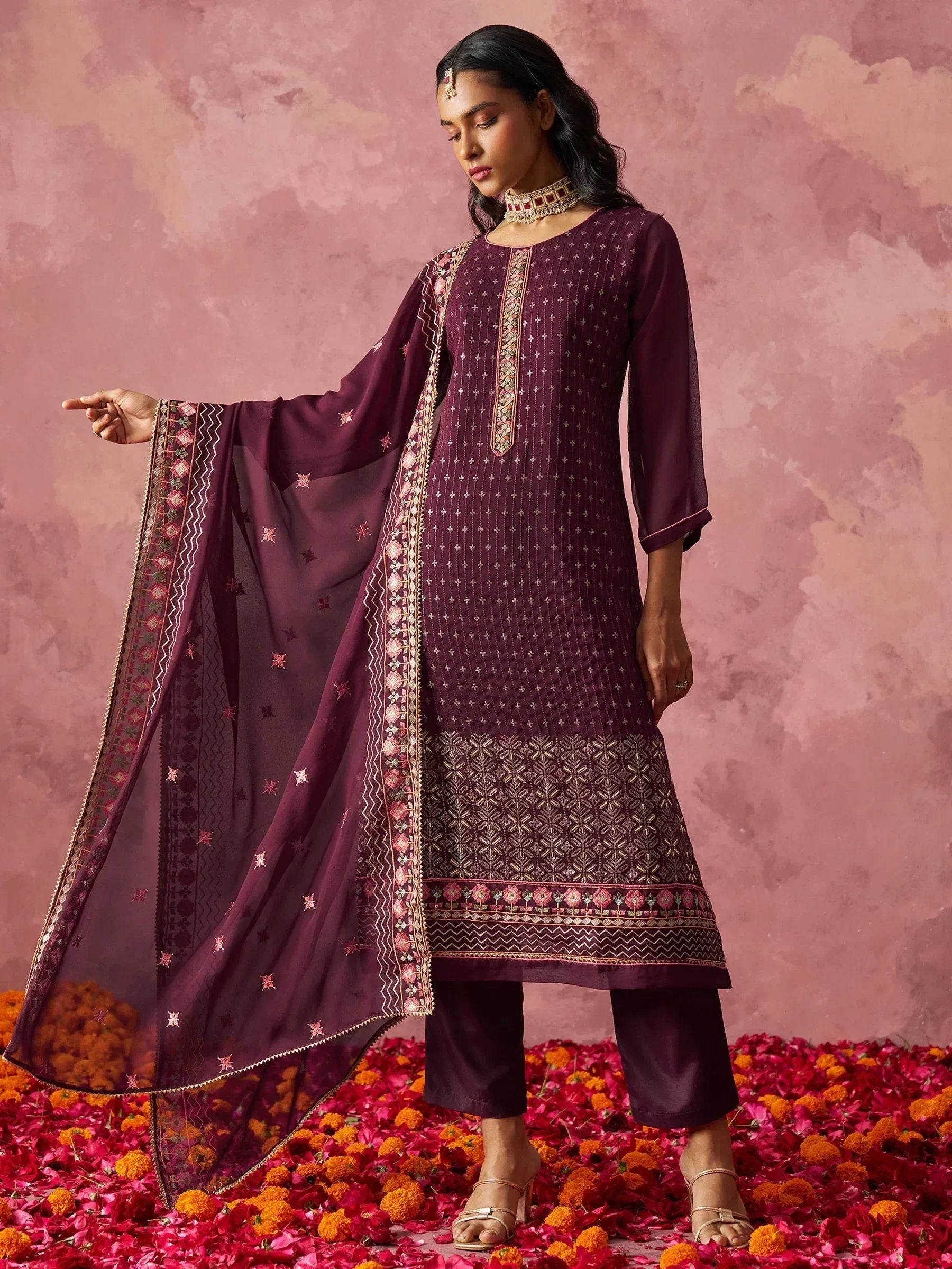 Elegant maroon embroidered salwar kameez with matching dupatta, perfect for Indian ethnic occasions.