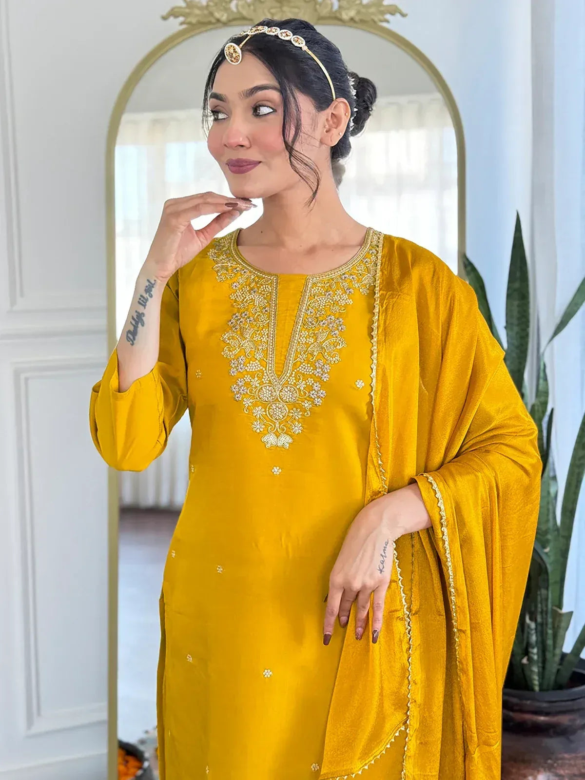 Yellow embroidered ethnic kurti with matching dupatta, perfect for Indian festive wear