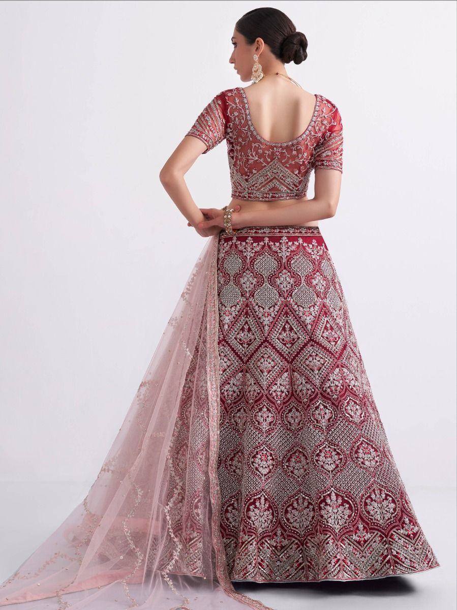 Red and silver embroidered lehenga choli with sheer dupatta, Indian ethnic wear for weddings
