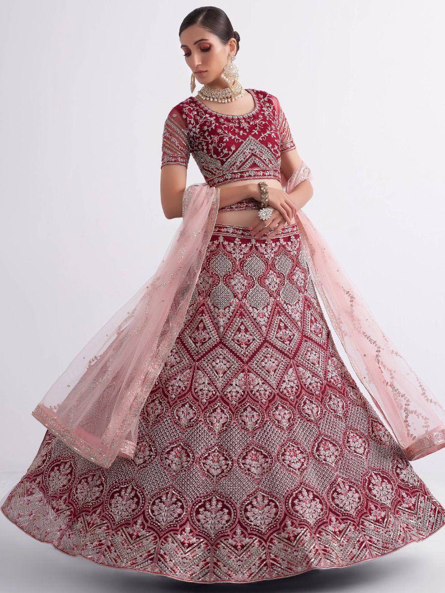 Maroon embroidered lehenga choli with pink dupatta, perfect for Indian weddings and festive occasions