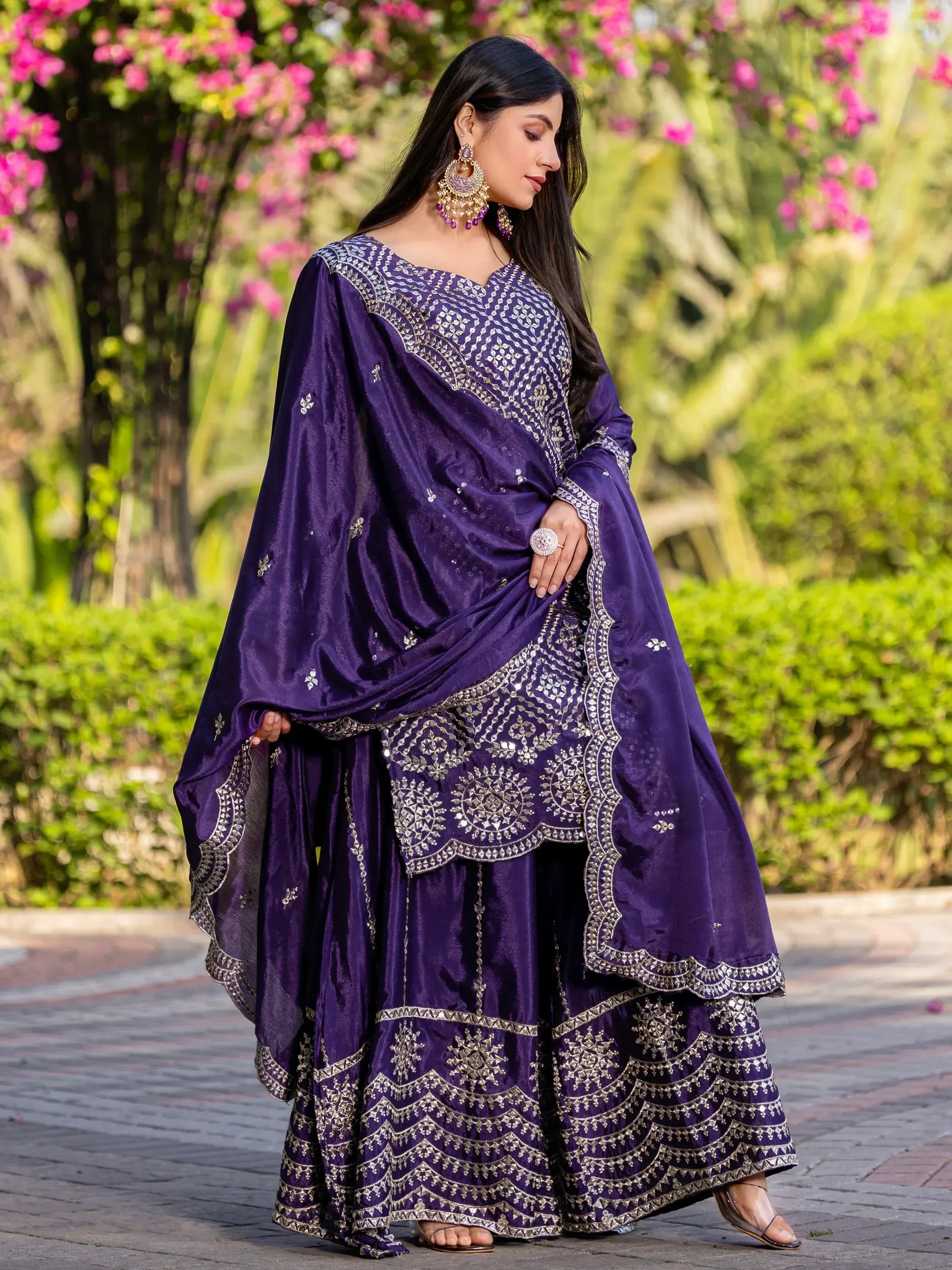 Purple embroidered Indian ethnic wear with mirror work, perfect for festive occasions and weddings.
