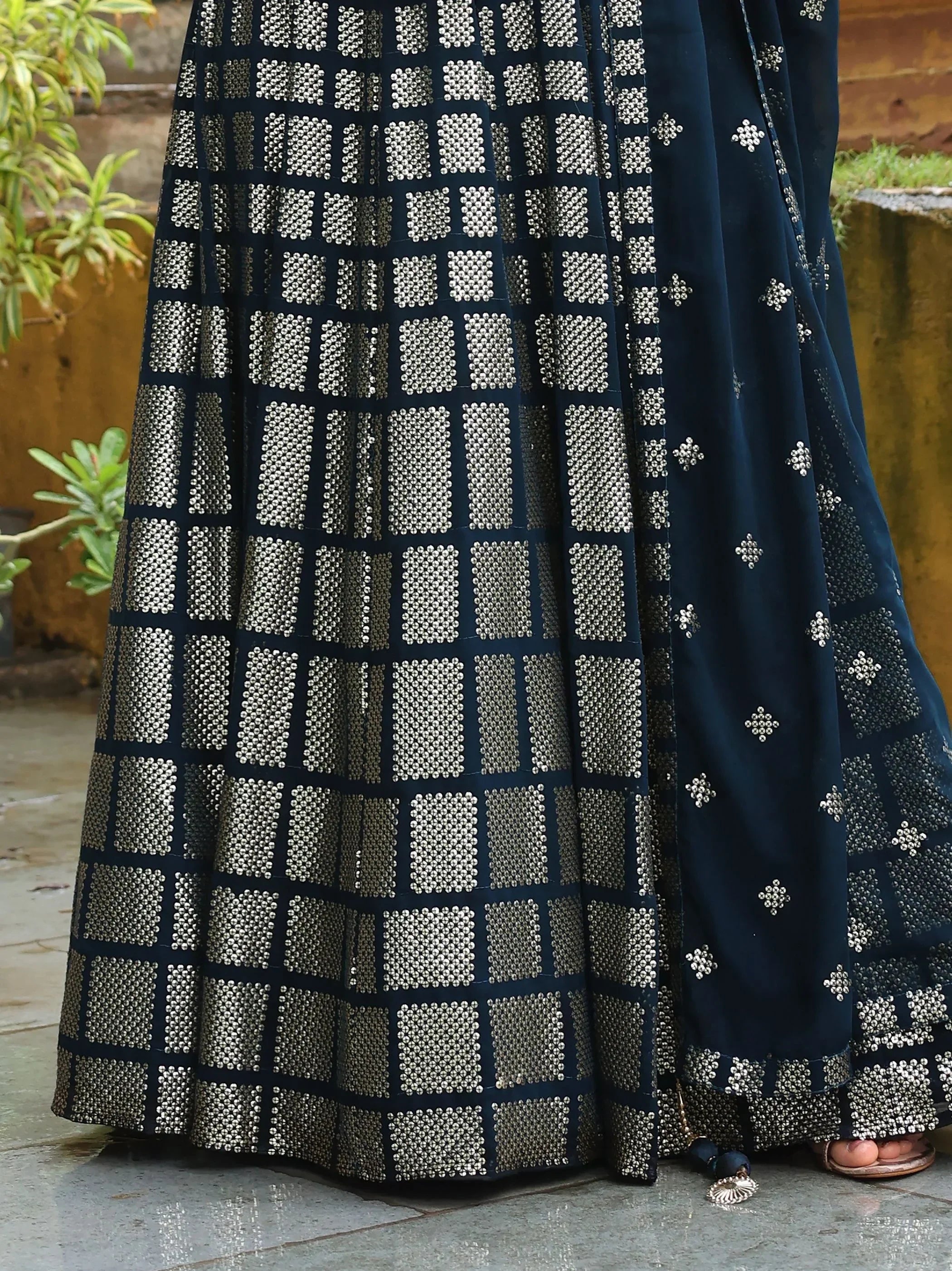 Navy blue ethnic lehenga with silver geometric embroidery, perfect for Indian weddings and festive occasions.