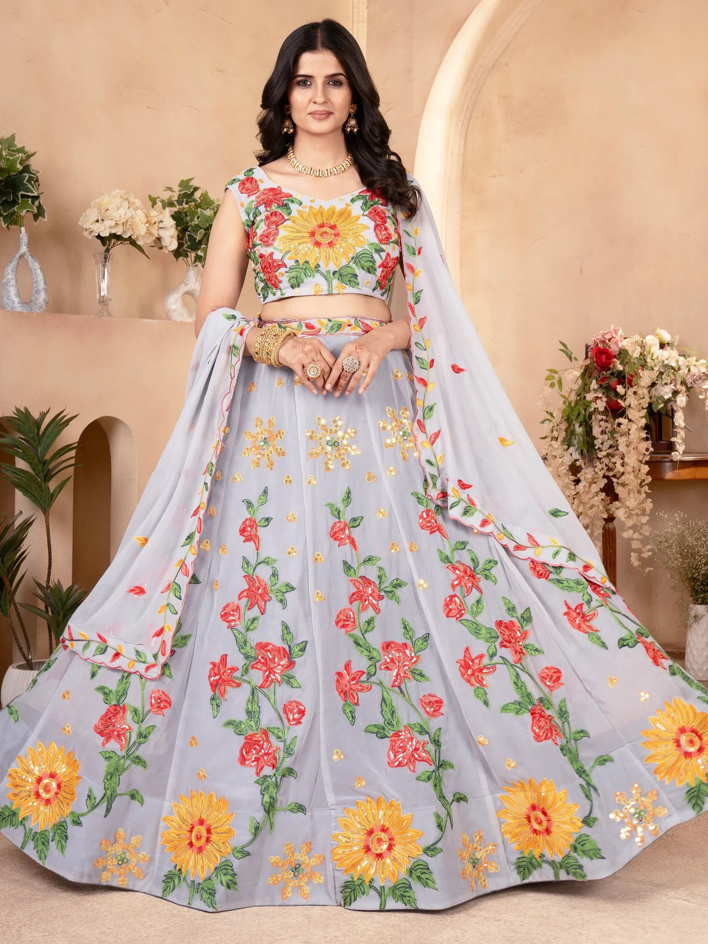 Grey floral embroidered lehenga choli with sunflower and rose motifs, perfect for Indian ethnic occasions