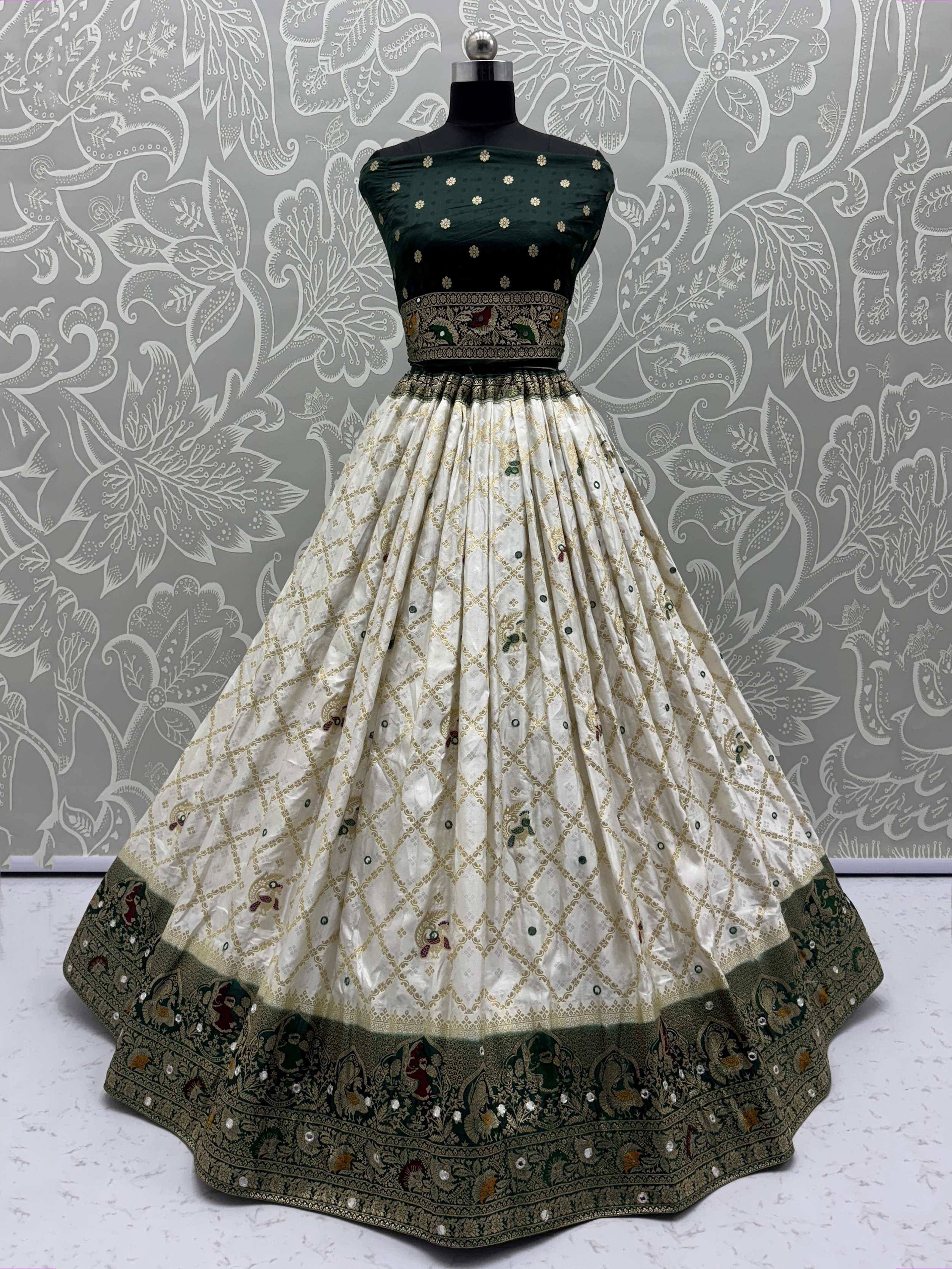 Green and cream designer lehenga choli with gold embroidery and floral border, perfect for Indian ethnic wear