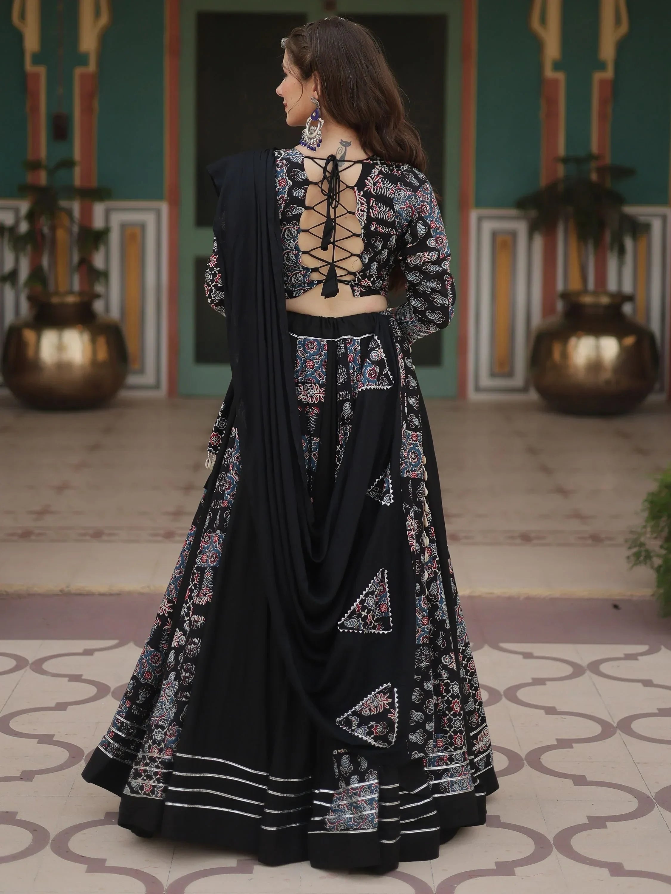 Black printed lehenga choli with lace-up back, ethnic Indian wear for women
