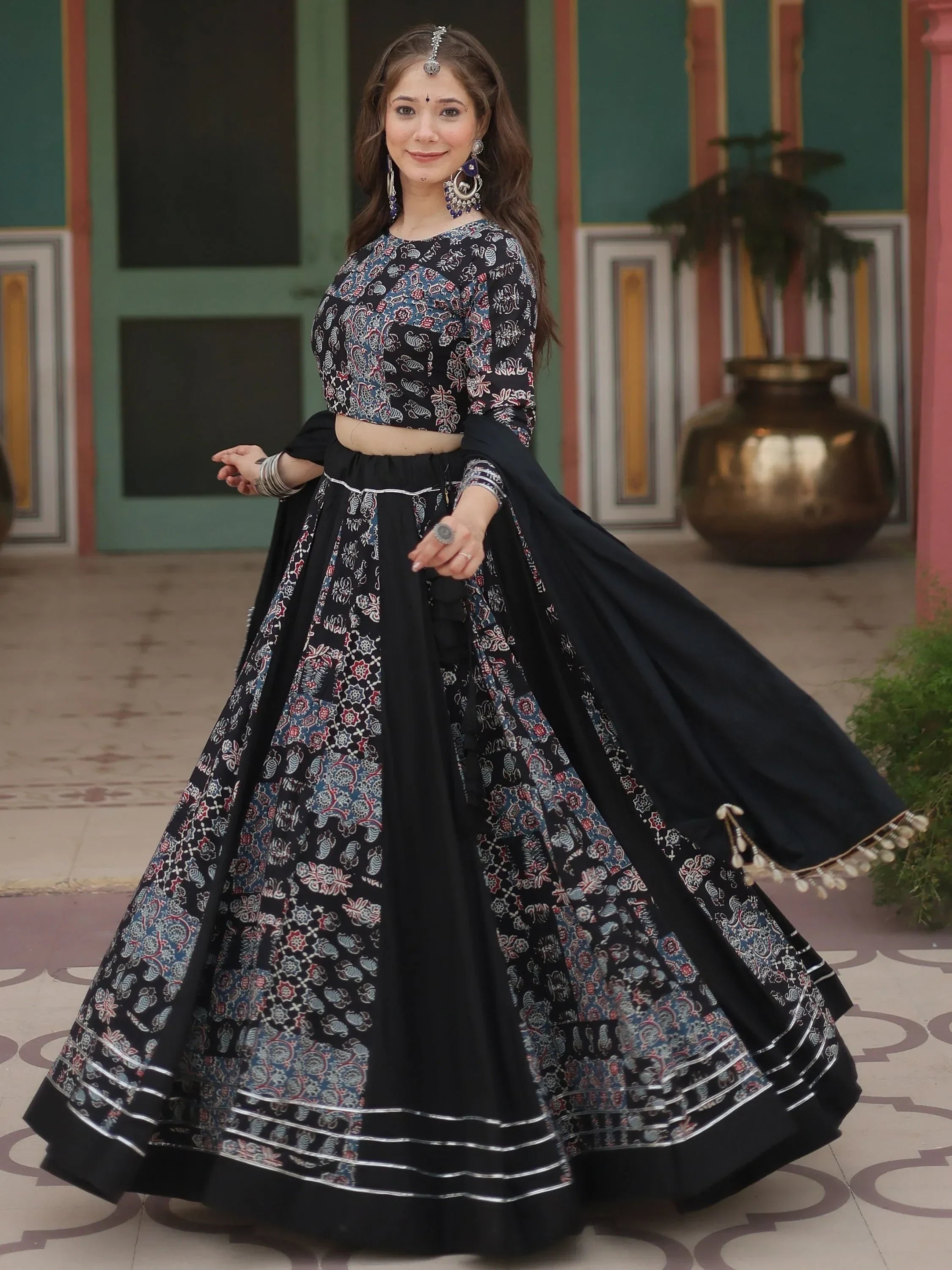 Black printed lehenga choli with silver trim, ethnic Indian wear for women