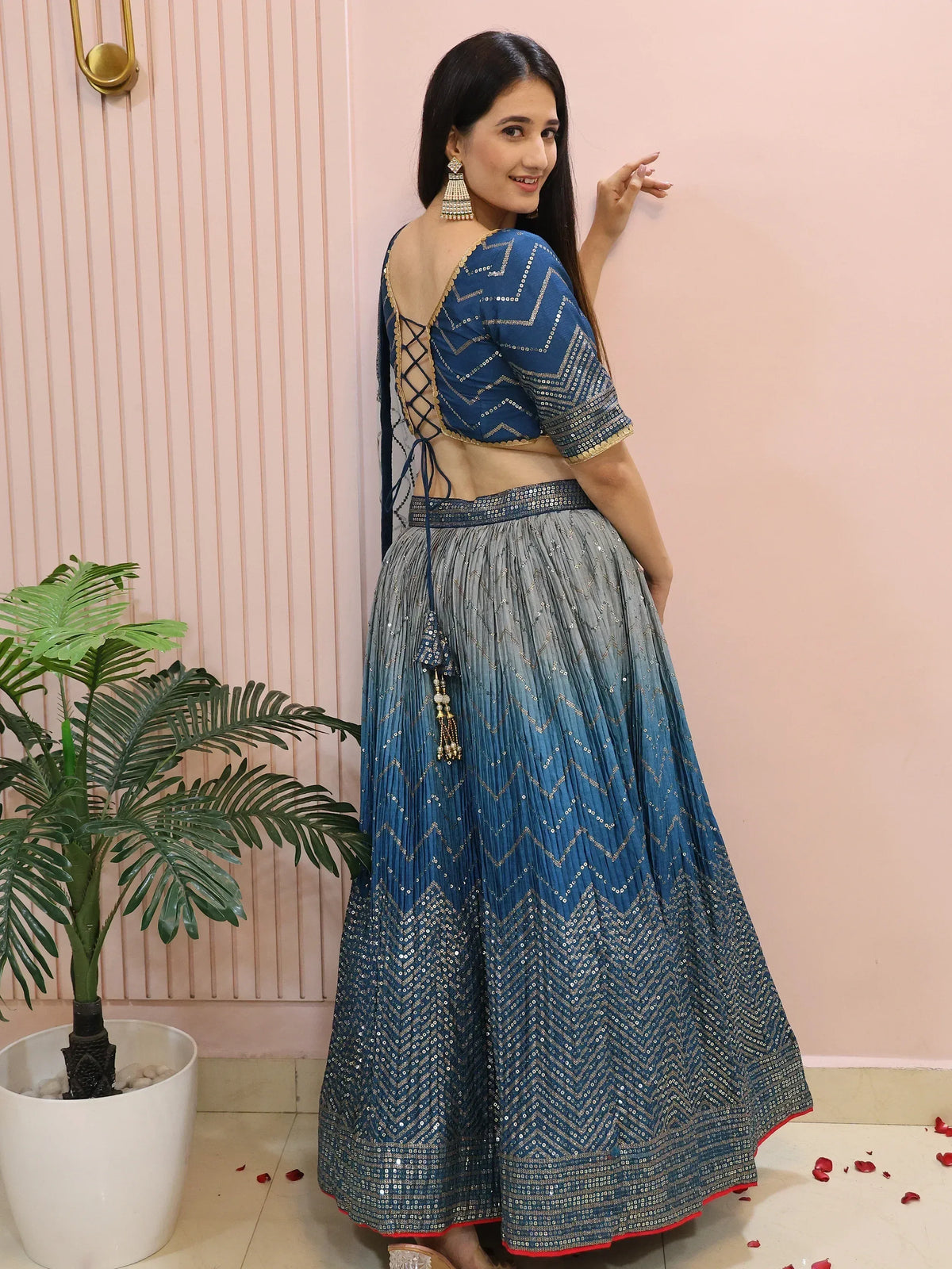 Blue sequin lehenga choli with back lace-up design, perfect for Indian ethnic wear occasions