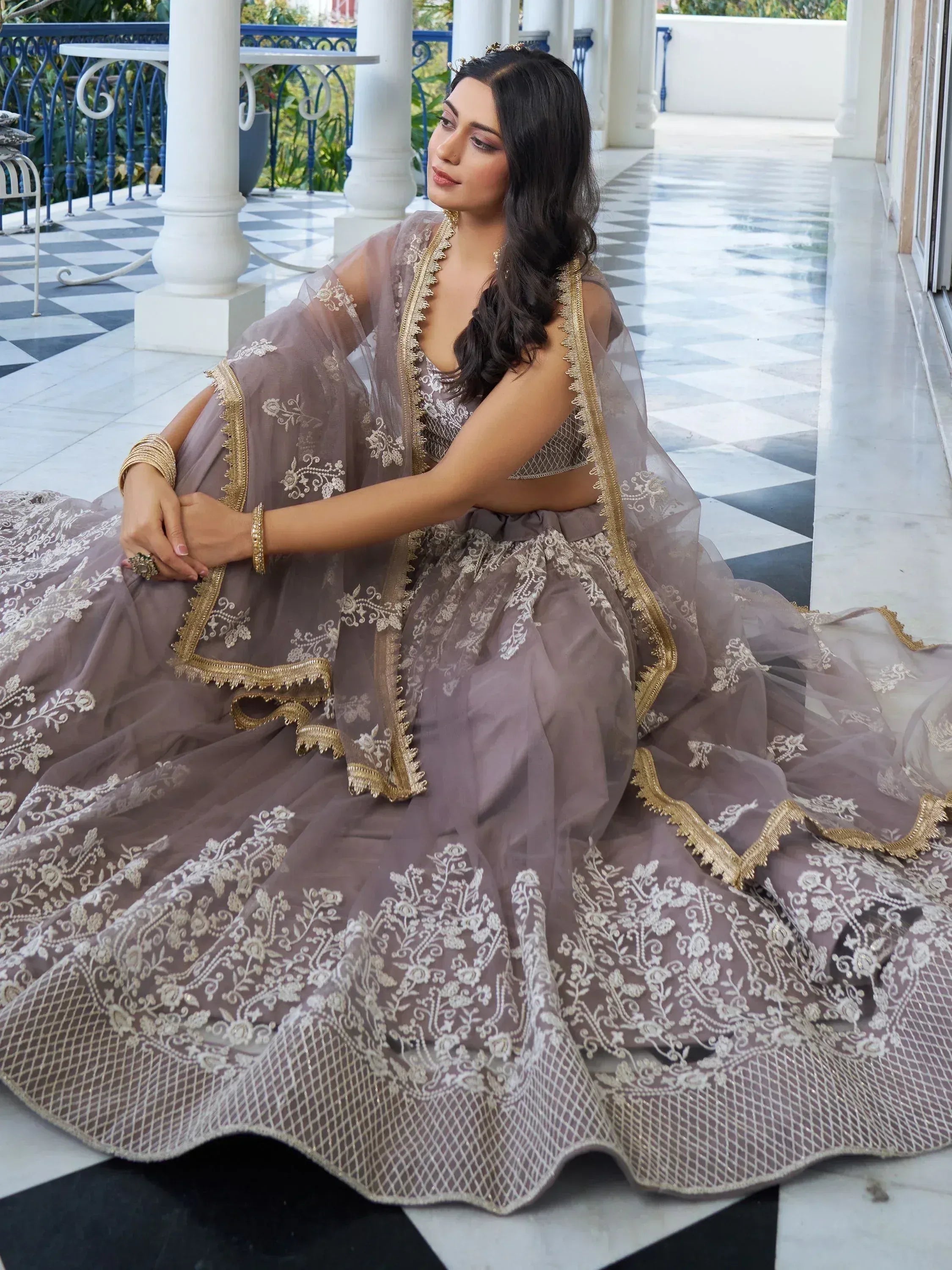 Elegant mauve lehenga choli with gold embroidery, perfect for Indian ethnic wear occasions