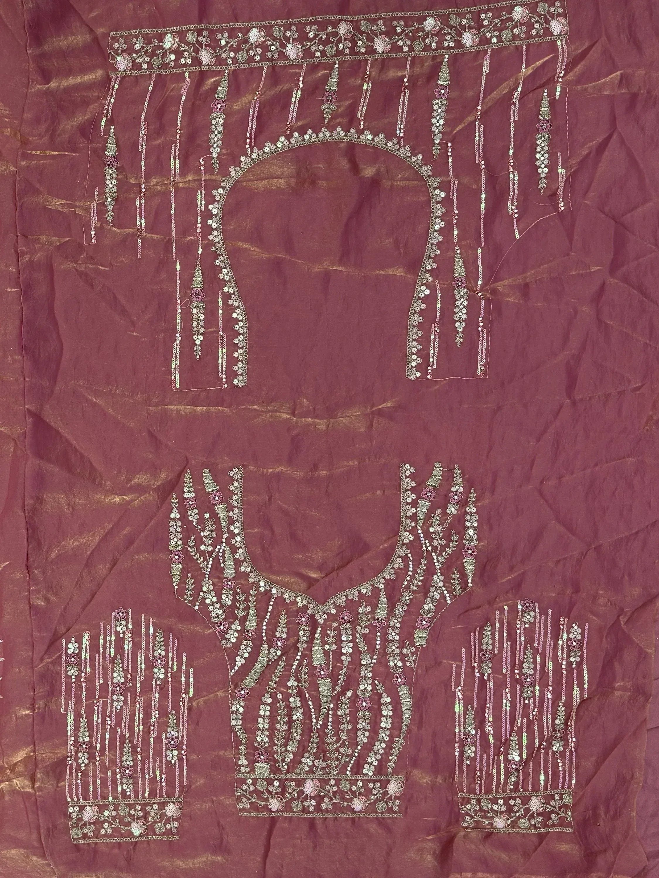 Maroon ethnic blouse with intricate floral embroidery and sequin detailing for Indian wear