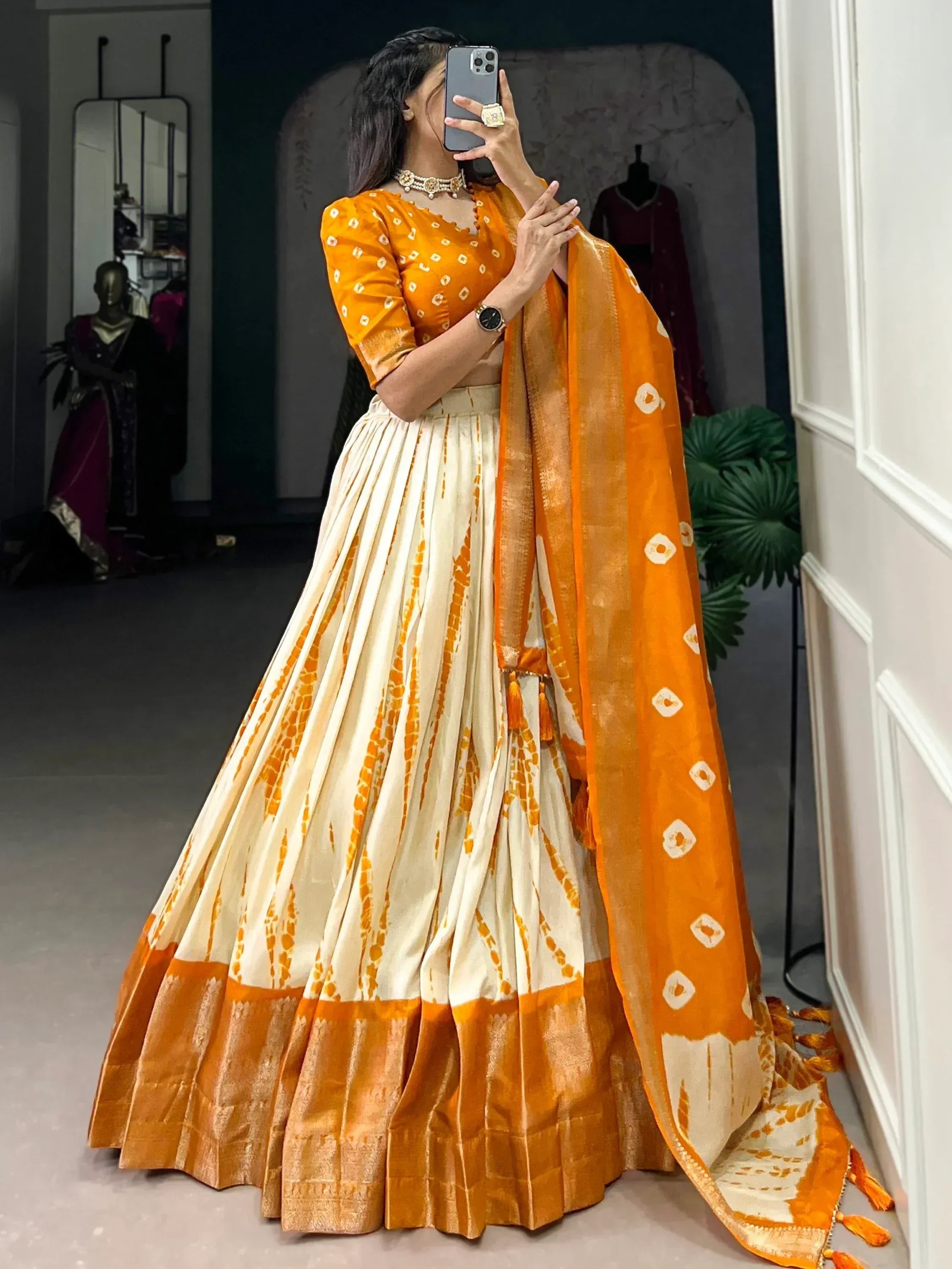 Orange and cream tie-dye lehenga choli with dupatta, Indian ethnic wear for women