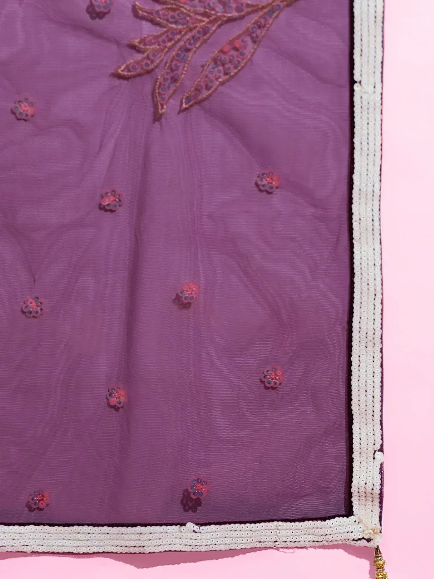Purple ethnic wear with floral embroidery and pearl border, perfect for Indian occasions