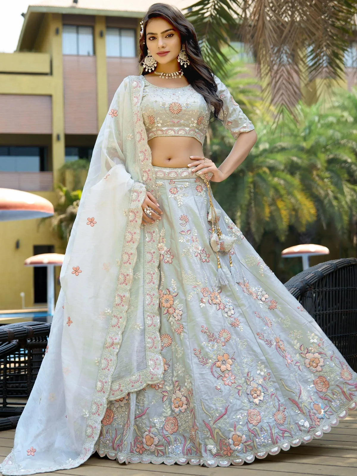Elegant pastel lehenga choli with floral embroidery, perfect for Indian ethnic occasions and weddings.