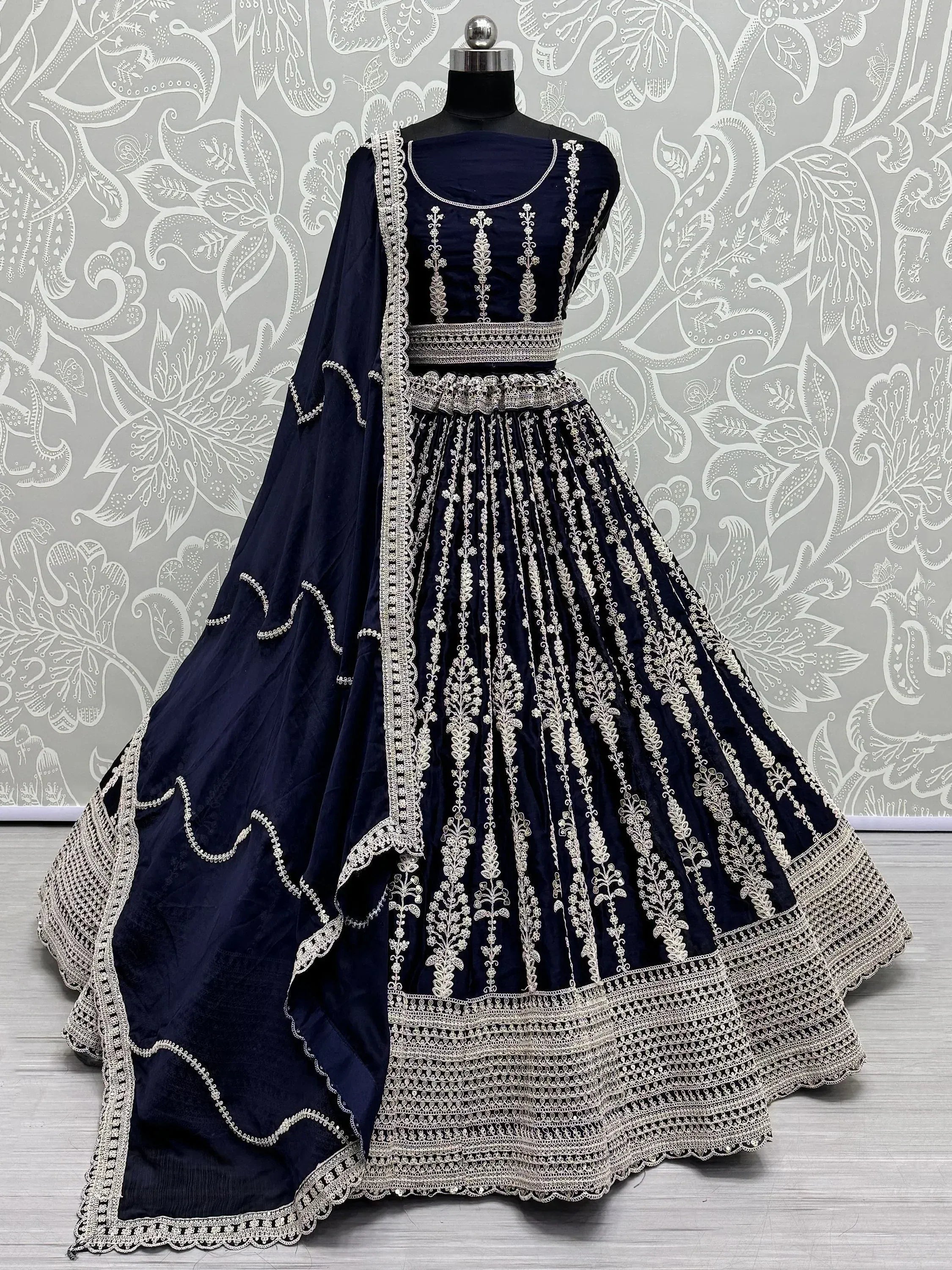 Navy blue embroidered lehenga choli with silver zari work, perfect for weddings and festive occasions