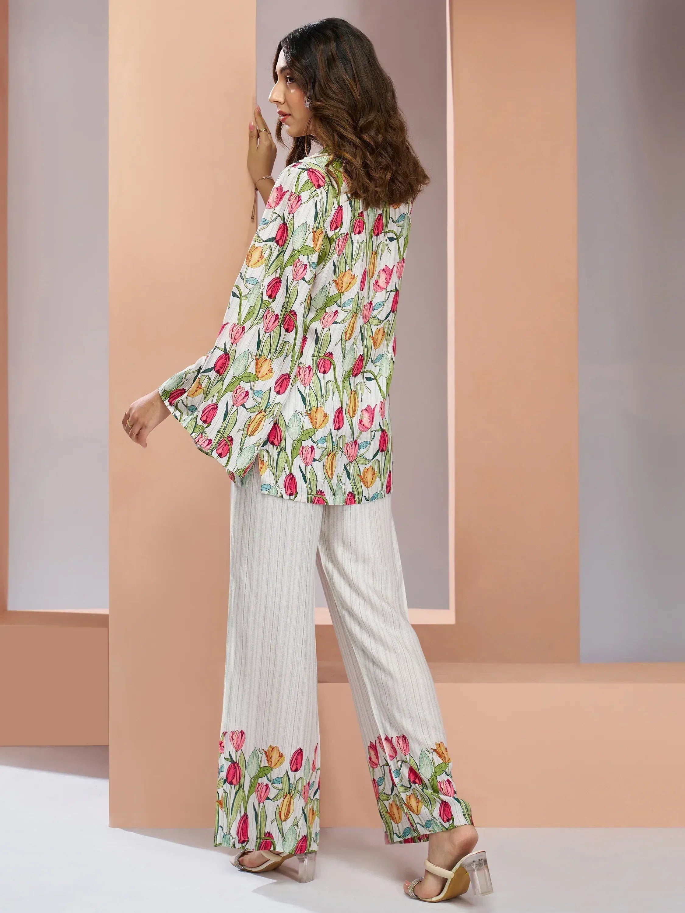 Floral print ethnic palazzo set with tulip design, wide sleeves, and striped pants for women
