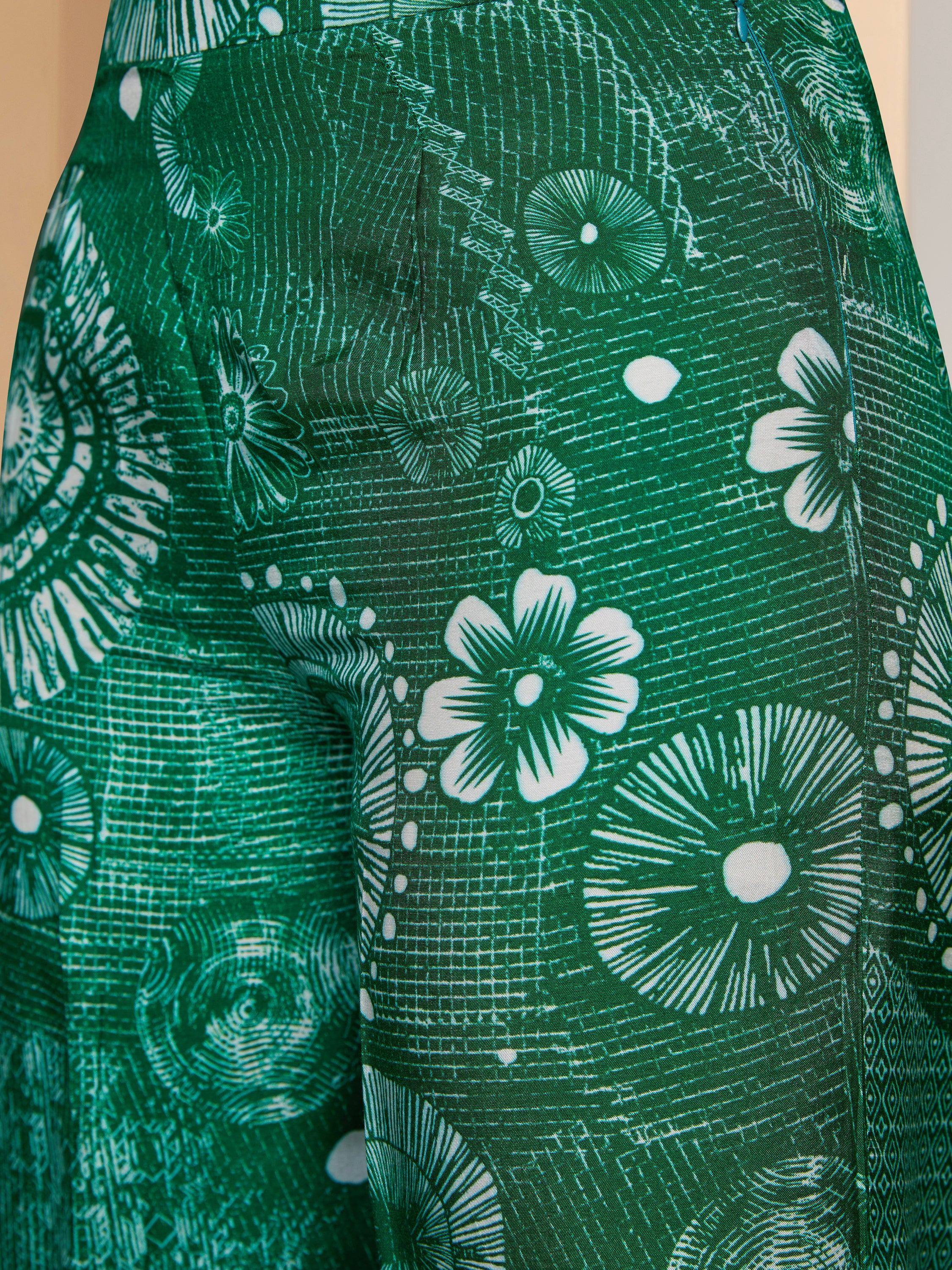 Green floral printed ethnic skirt with white botanical patterns, ideal for Indian wear