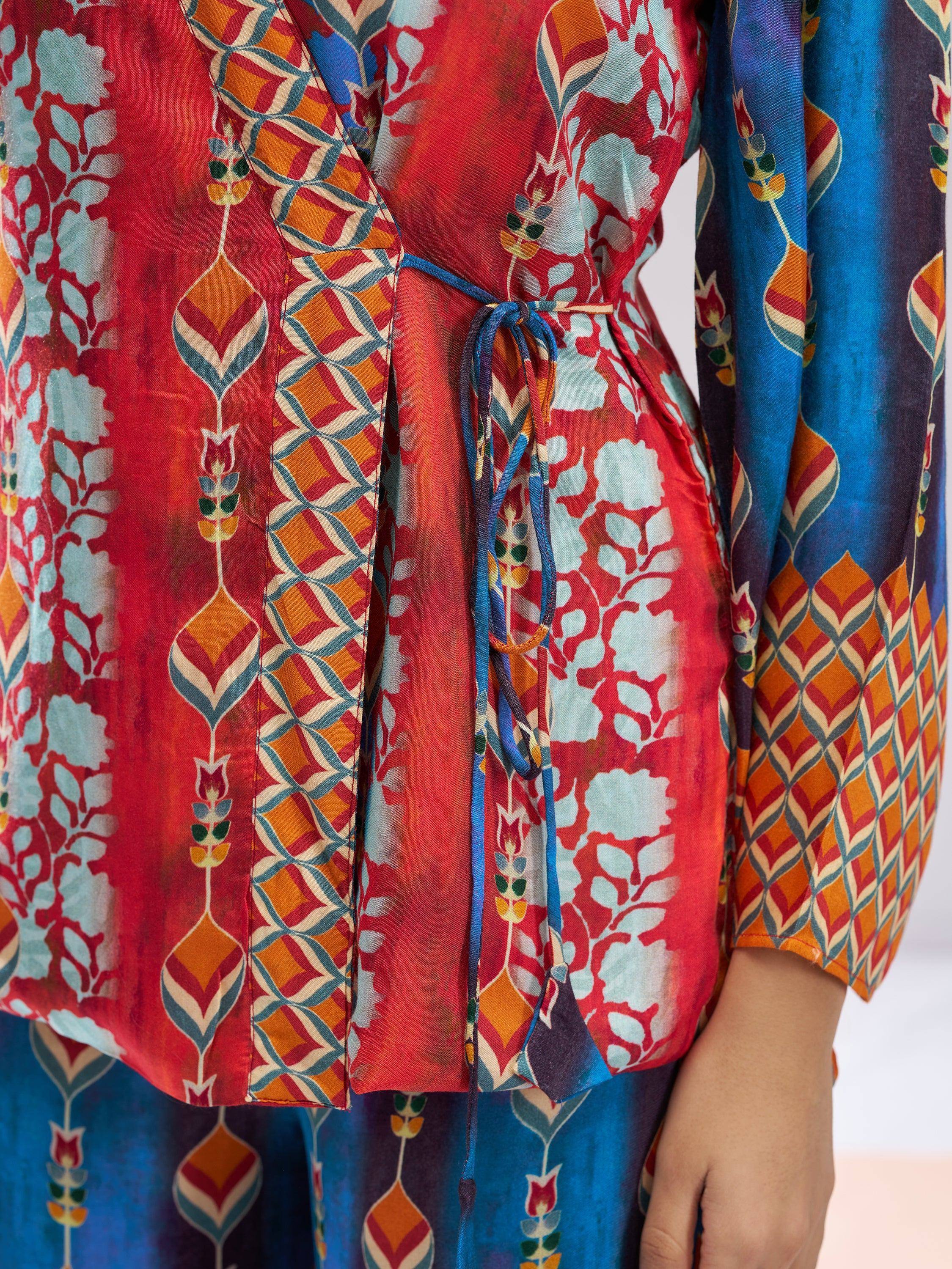 Vibrant red and blue printed ethnic kurta with floral geometric patterns and tie waist detail