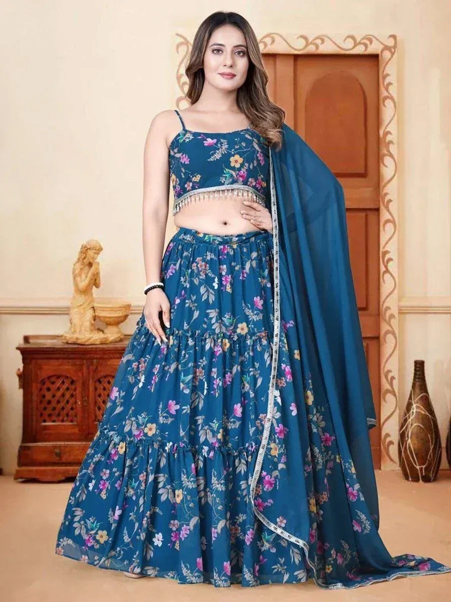 Blue floral lehenga choli with silver trim, perfect for Indian ethnic wear occasions