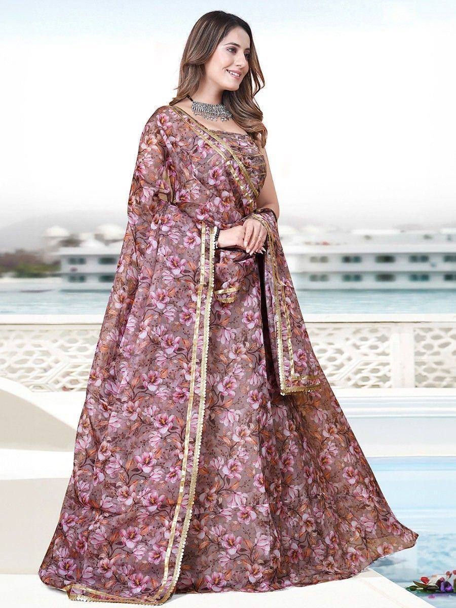 Floral print ethnic gown with gold trim, perfect for Indian occasions and festive wear