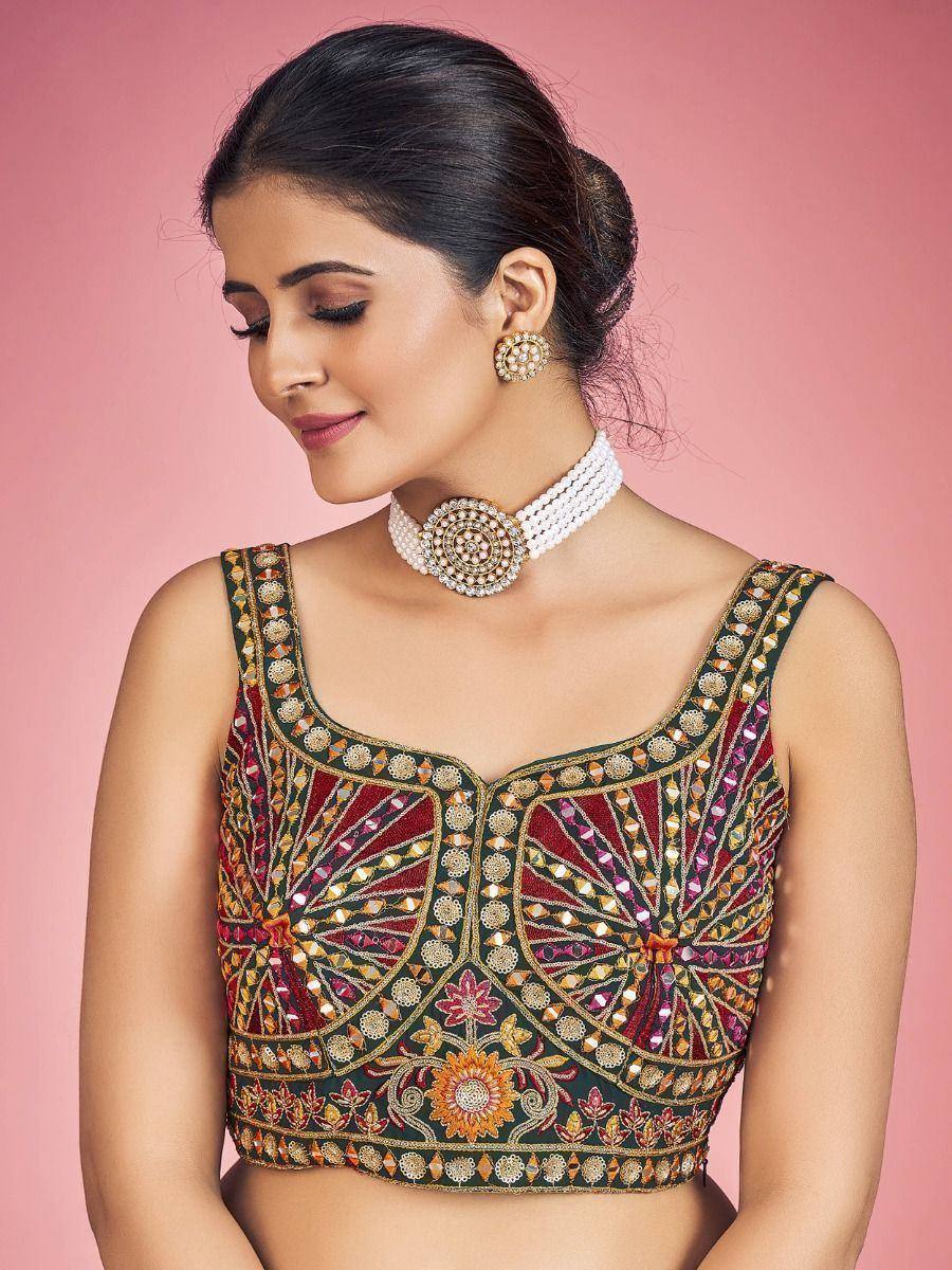 Embroidered designer lehenga choli blouse with mirror work and pearl choker, perfect for Indian ethnic wear