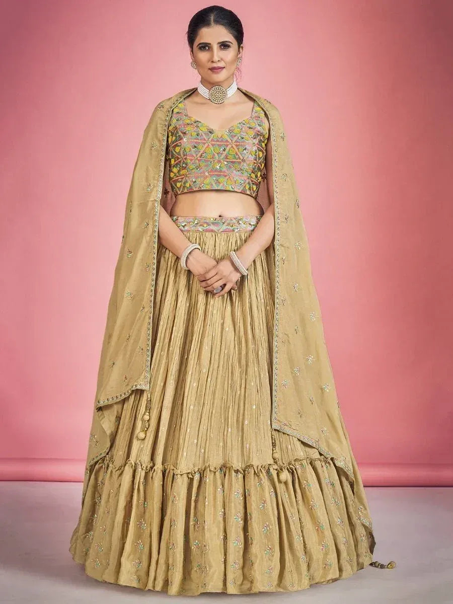 Elegant beige embroidered lehenga choli with floral dupatta, perfect for Indian ethnic occasions